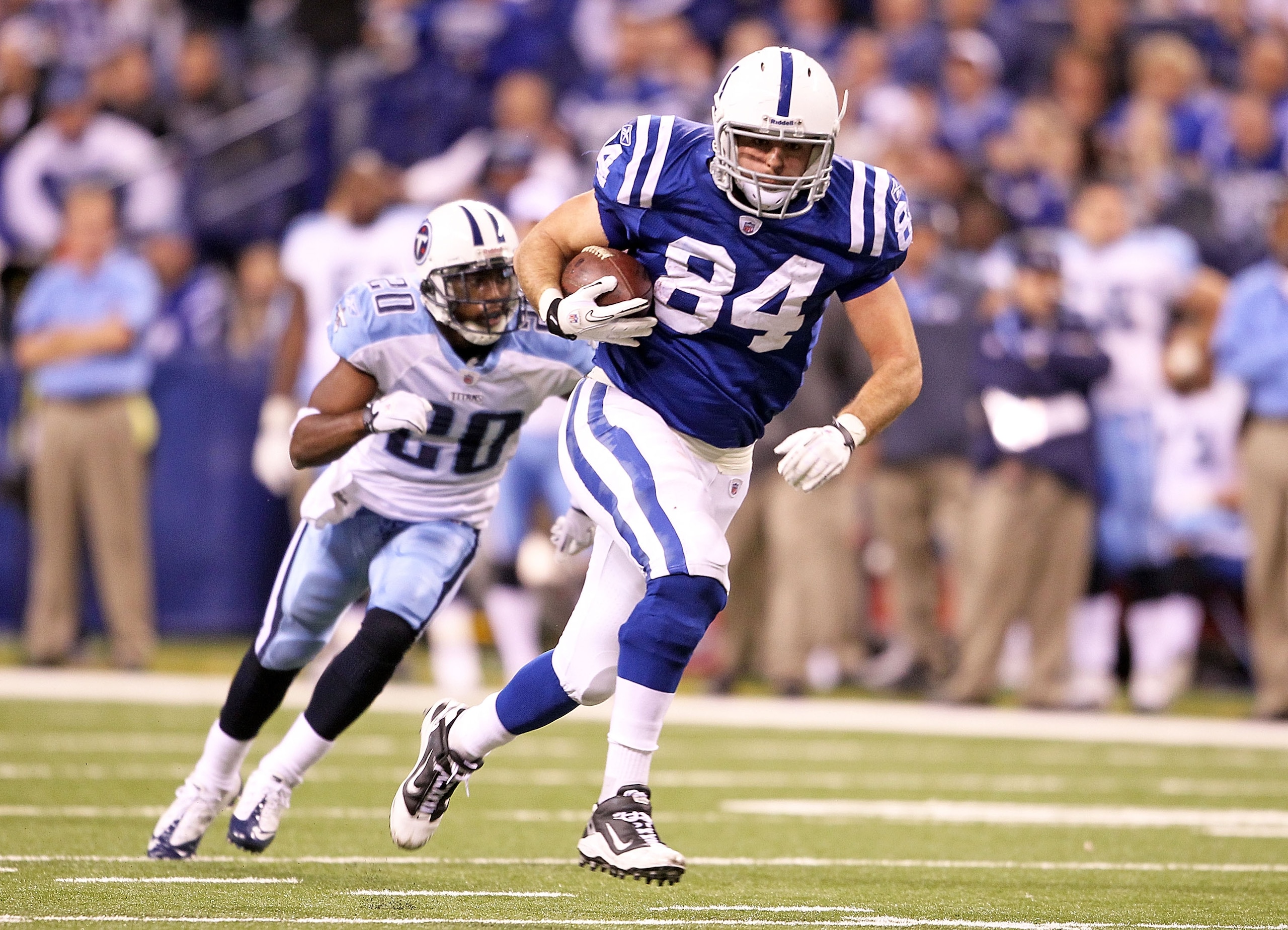 INDIANAPOLIS - JANUARY 02: Jacob Tamme #84 of the Indianapolis Colts runs with the ball during NFL game against the Tennessee Titans at Lucas Oil Stadium on January 2, 2011 in Indianapolis, Indiana.  (Photo by Andy Lyons/Getty Images)