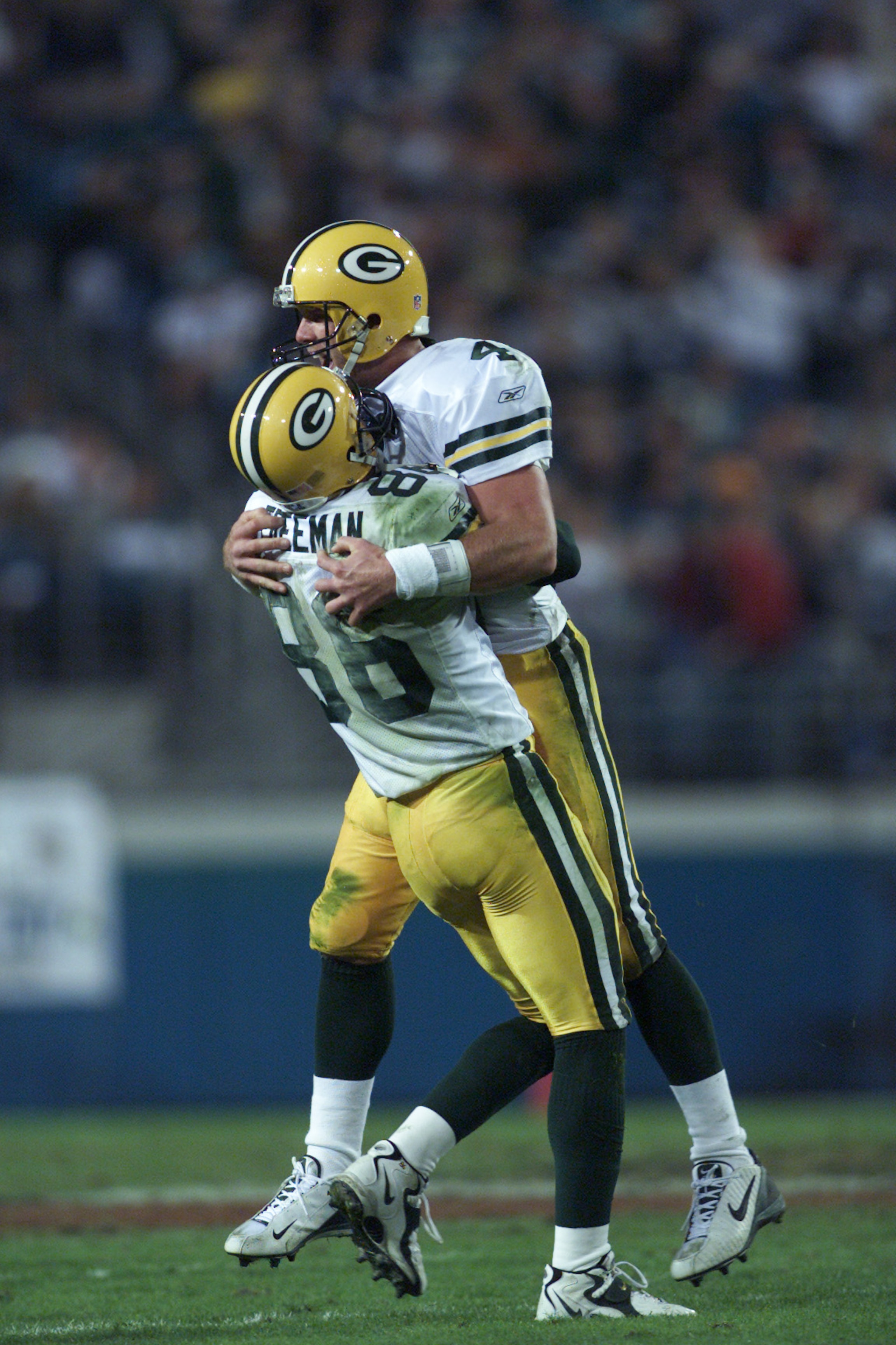 03 Dec 2001 : Quarterback Brett Favre #4 of the Green Bay Packers celebrates scoring against the Jacksonville Jaguars with teammate Antonio Freeman #86 during the game at Alltel Stadium in Jacksonville, Florida. The Packers won 28-21. DIGITAL IMAGE. Manda