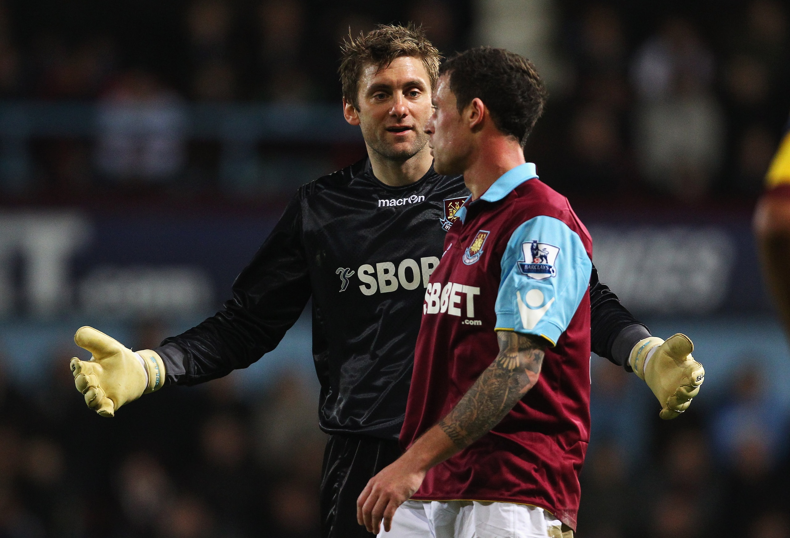 LONDON, ENGLAND - JANUARY 15: Goalkeeper Rob Green of West Ham United talks to Wayne Bridge during the Barclays Premier League match between West Ham United and Arsenal at the Boleyn Ground on January 15, 2011 in London, England.  (Photo by Clive Rose/Get