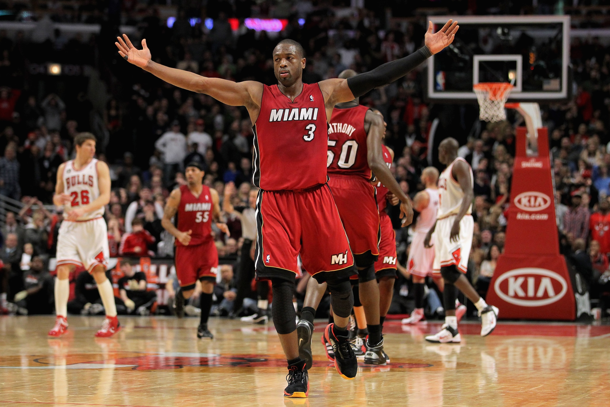 CHICAGO, IL - JANUARY 15:  Dwyane Wade #3 of the Miami Heat celebrates his three point field goal with 37 seconds remaining in the game to give hte Heat a 96-95 lead over the Chicago Bulls at the United Center on January 15, 2011 in Chicago, Illinois. The