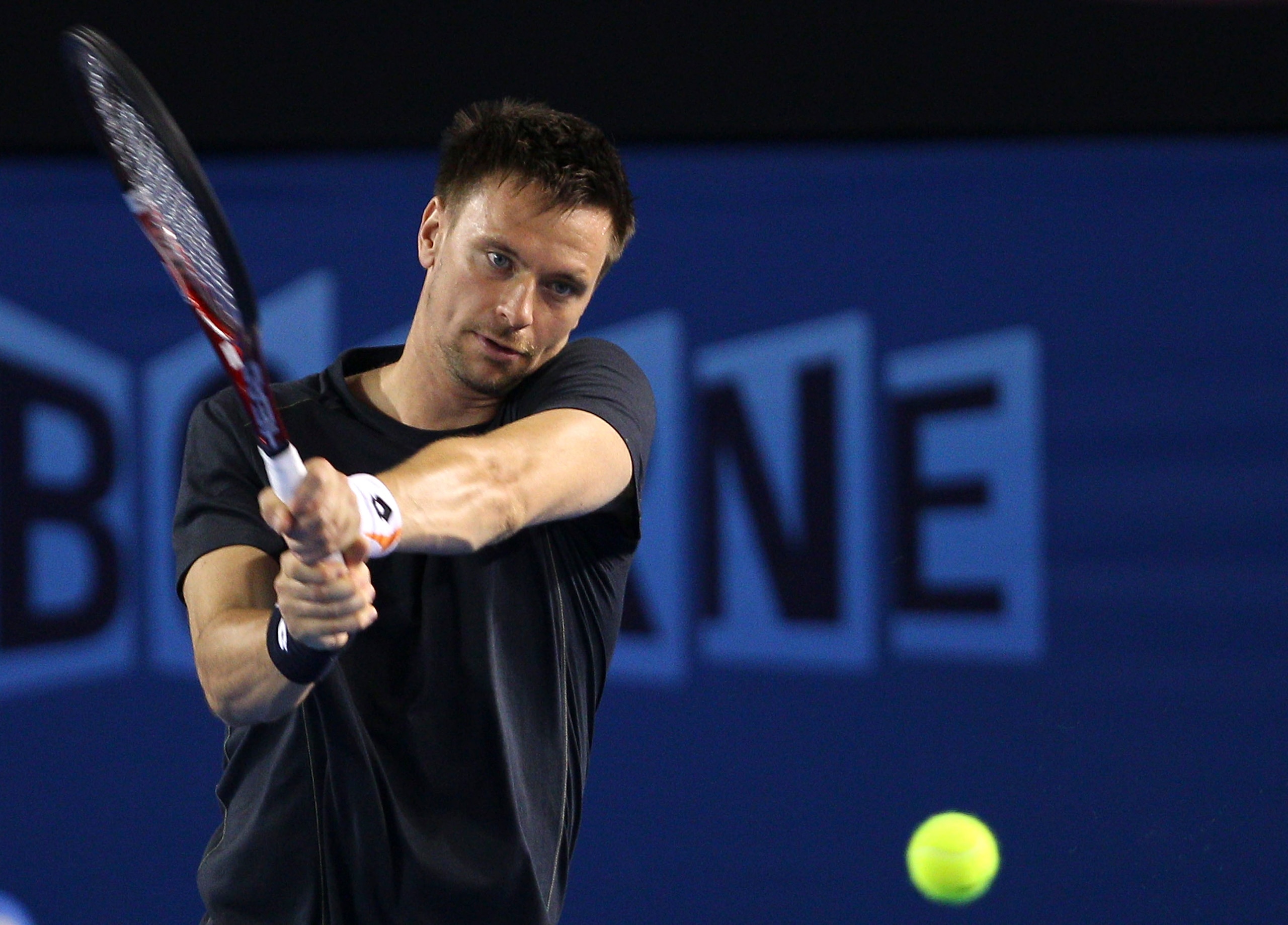 MELBOURNE, AUSTRALIA - JANUARY 14:  Robin Soderling of Switzerland hits a backhand shot during a practice session ahead of the 2011 Australian Open at Melbourne Park on January 14, 2011 in Melbourne, Australia.  (Photo by Lucas Dawson/Getty Images)