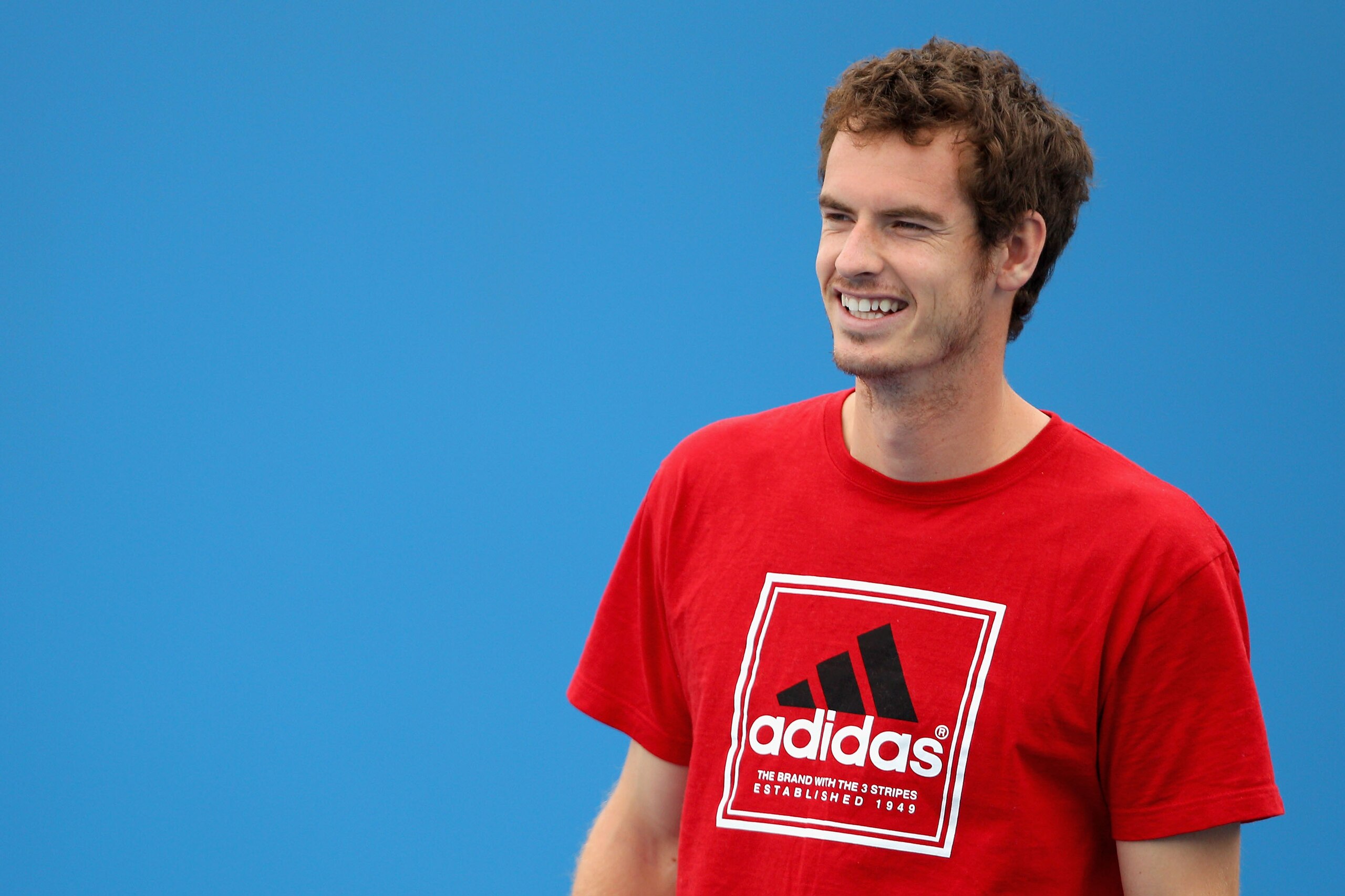 MELBOURNE, AUSTRALIA - JANUARY 17:  Andy Murray of Great Britain smiles during a practice session on day one of the 2011 Australian Open at Melbourne Park on January 17, 2011 in Melbourne, Australia.  (Photo by Lucas Dawson/Getty Images)
