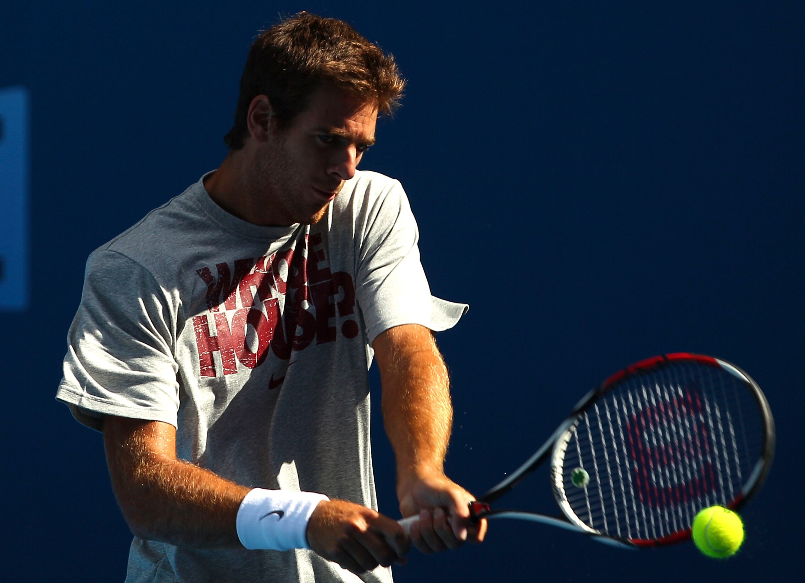 MELBOURNE, AUSTRALIA - JANUARY 14:  Juan Martin Del Potro of Argentina hits a backhand shot  during a practice session during a practice session ahead of the 2011 Australian Open at Melbourne Park on January 14, 2011 in Melbourne, Australia.  (Photo by Lu