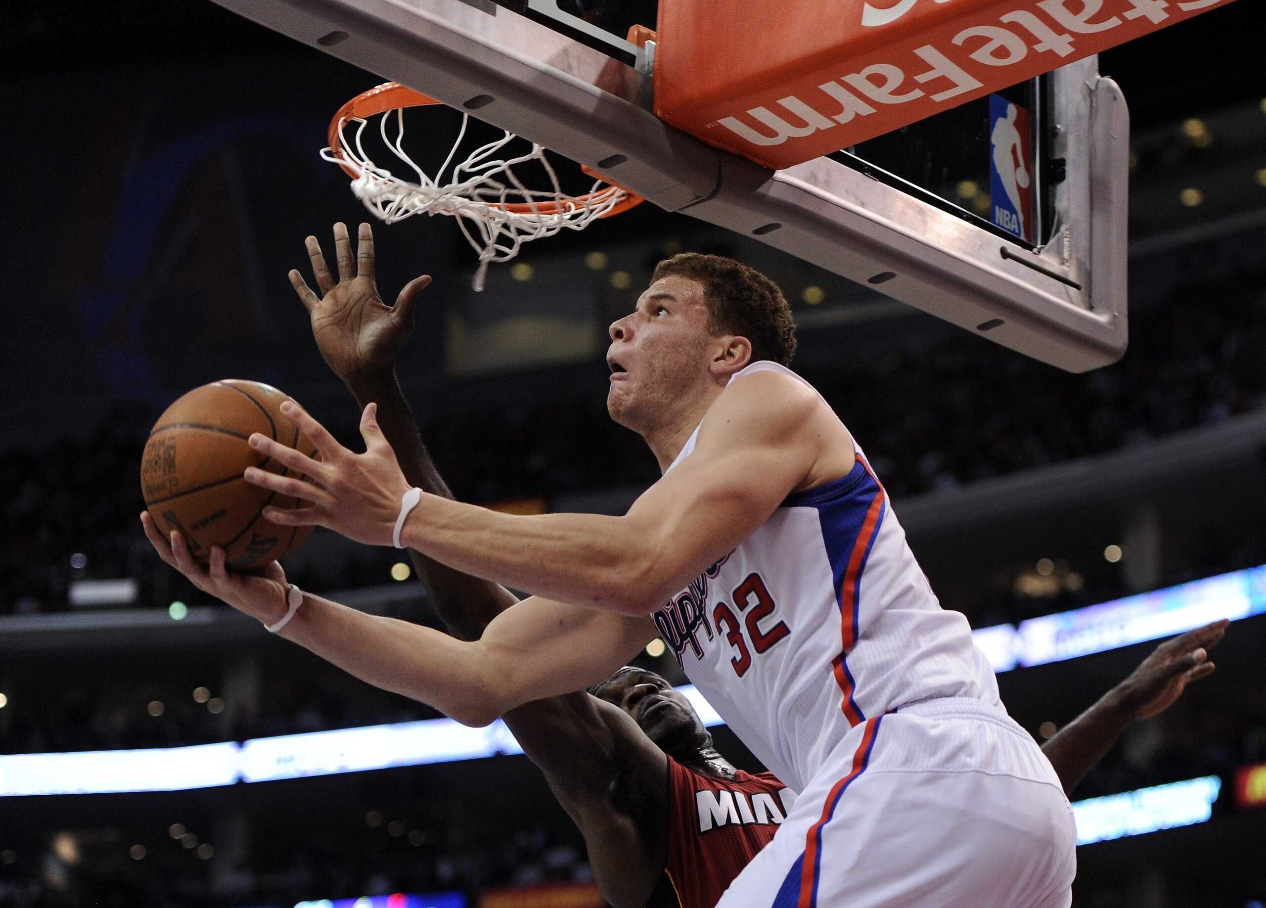 LOS ANGELES, CA - JANUARY 12: Blake Griffin #32 of the Los Angeles Clippers scores a reverse layup in front of Joel Anthony #50 of the Miami Heat during the first half at the Staples Center on January 12, 2011 in Los Angeles, California. NOTE TO USER: U LOS ANGELES, CA - JANUARY 12: Blake Griffin #32 of the Los Angeles Clippers scores a reverse layup in front of Joel Anthony #50 of the Miami Heat during the first half at the Staples Center on January 12, 2011 in Los Angeles, California. NOTE TO USER: U