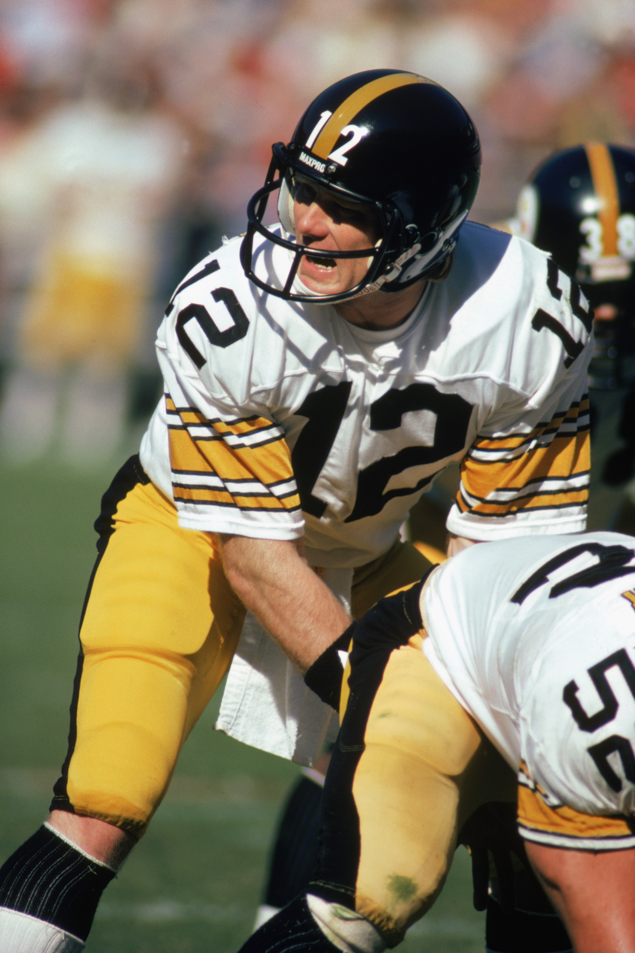 ATLANTA - NOVEMBER 1:  Quarterback Terry Bradshaw #12 of the Pittsburgh Steelers calls the play during the game against the Atlanta Falcons at Fulton County Stadium on November 1, 1981 in Atlanta, Georgia. The Steelers defeated the Falcons 34-20.  (Photo