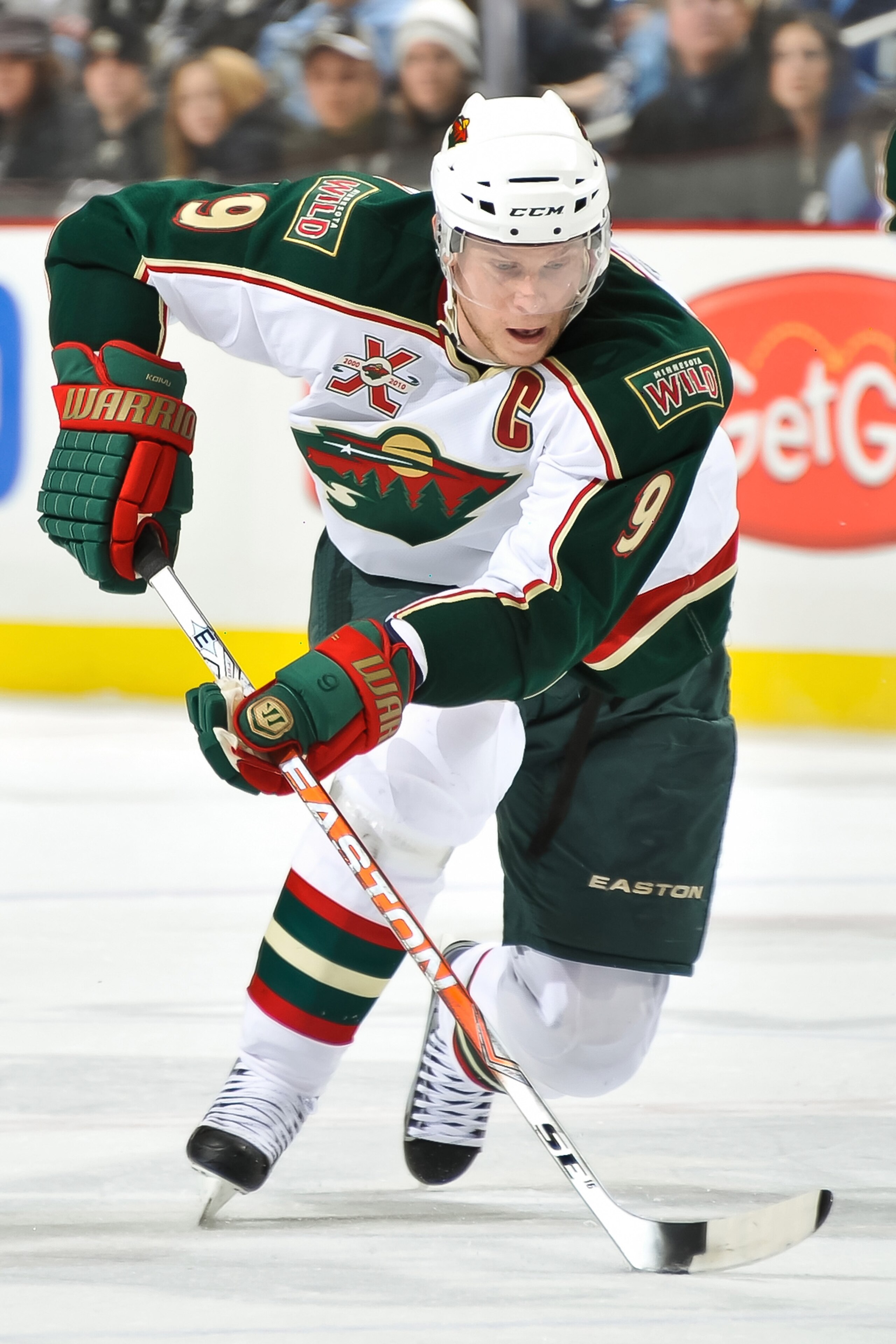 PITTSBURGH, PA - JANUARY 08:  Mikko Koivu #9 of the Minnesota Wild skates with the puck against the Pittsburgh Penguins on January 8, 2011 at CONSOL Energy Center in Pittsburgh, Pennsylvania.  (Photo by Jamie Sabau/Getty Images)