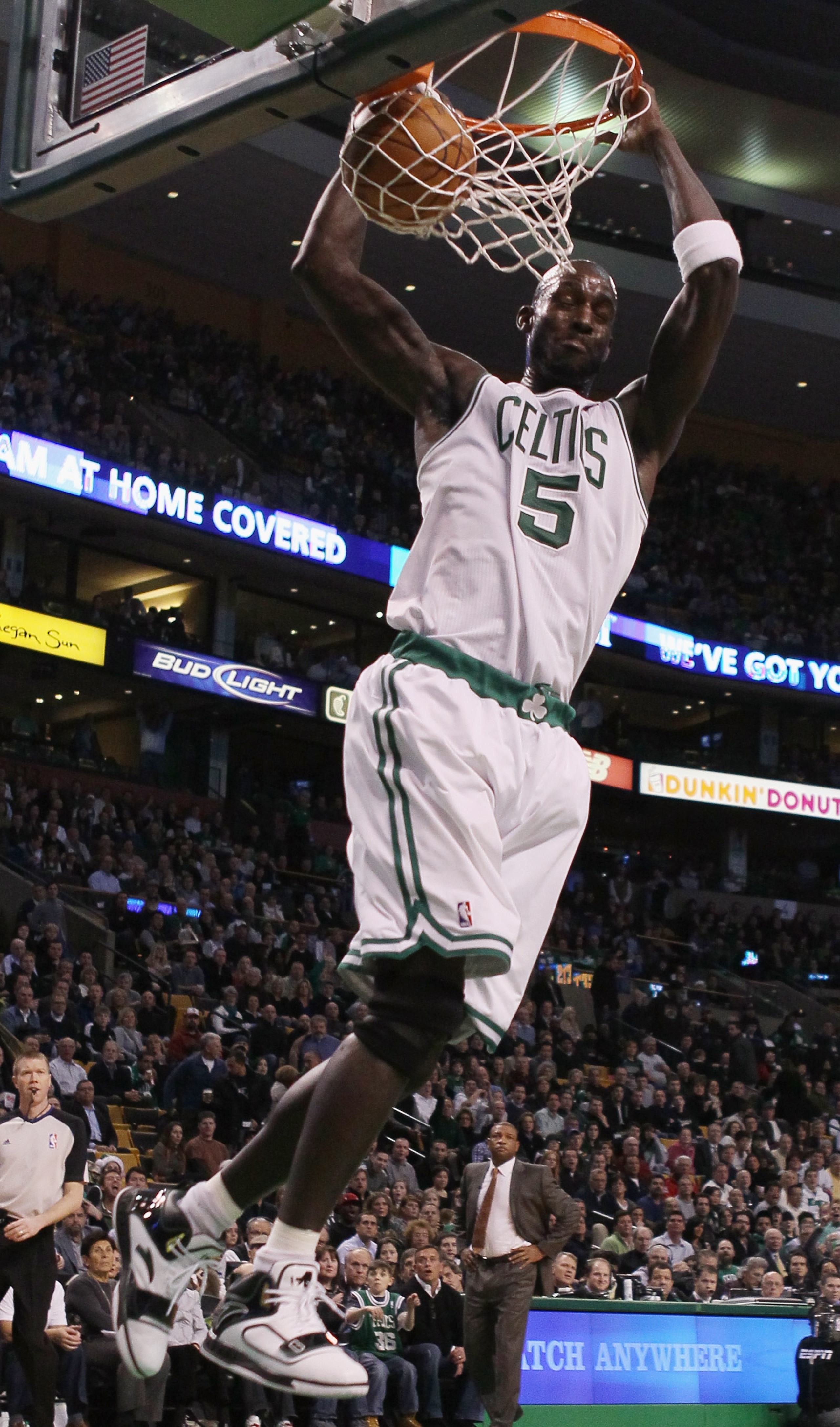BOSTON, MA - DECEMBER 08:  Kevin Garnett #5 of the Boston Celtics dunks the ball in the first half against the Denver Nuggets on December 8, 2010 at the TD Garden in Boston, Massachusetts. NOTE TO USER: User expressly acknowledges and agrees that, by down