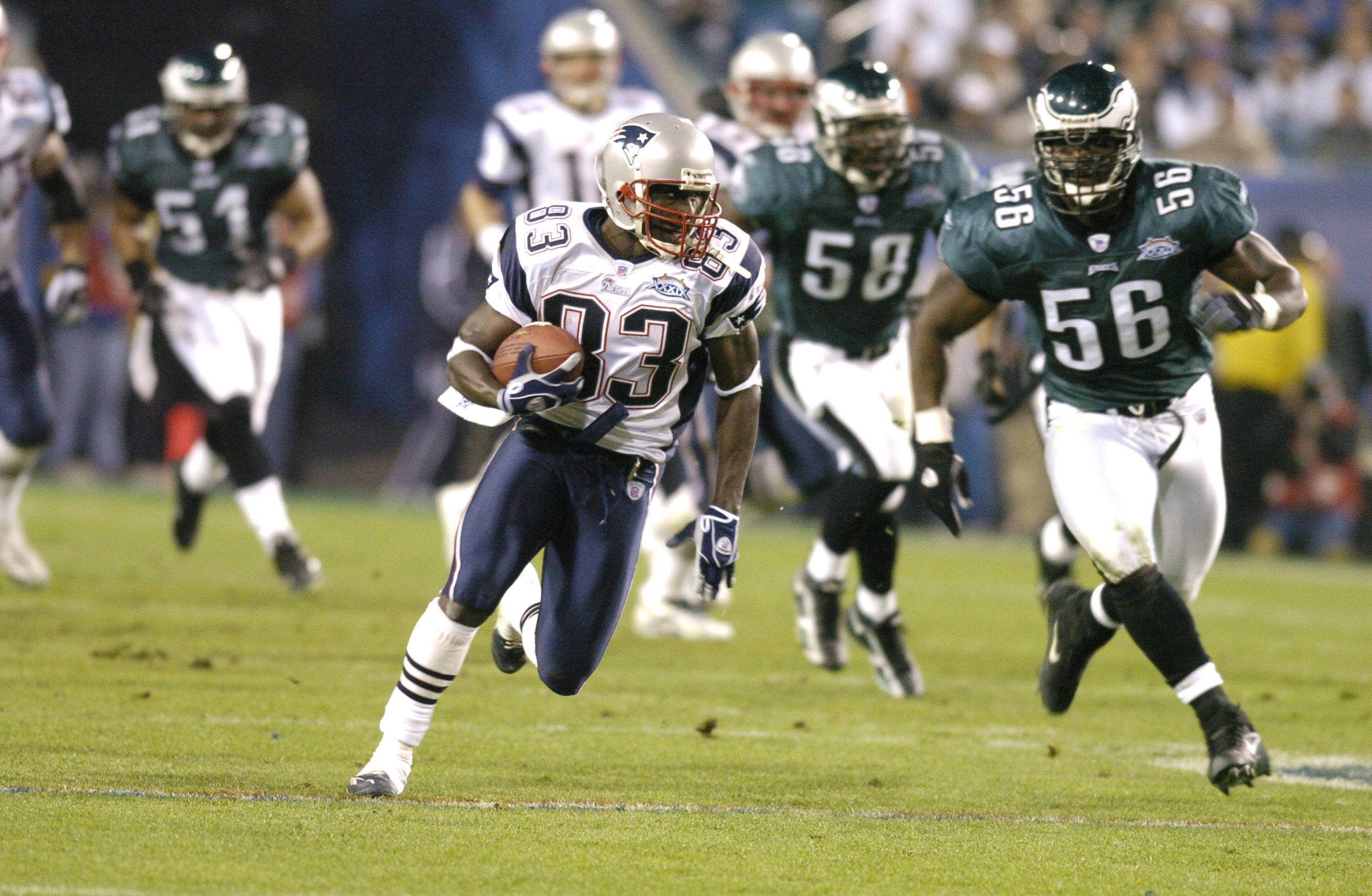 New England Patriots Deion Branch #83 runs with the ball during Super Bowl XXXIX between the Philadelphia Eagles and the New England Patriots at Alltel Stadium in Jacksonville, Florida on February 6, 2005. (Photo by Al Messerschmidt/Getty Images) New England Patriots Deion Branch #83 runs with the ball during Super Bowl XXXIX between the Philadelphia Eagles and the New England Patriots at Alltel Stadium in Jacksonville, Florida on February 6, 2005. (Photo by Al Messerschmidt/Getty Images)