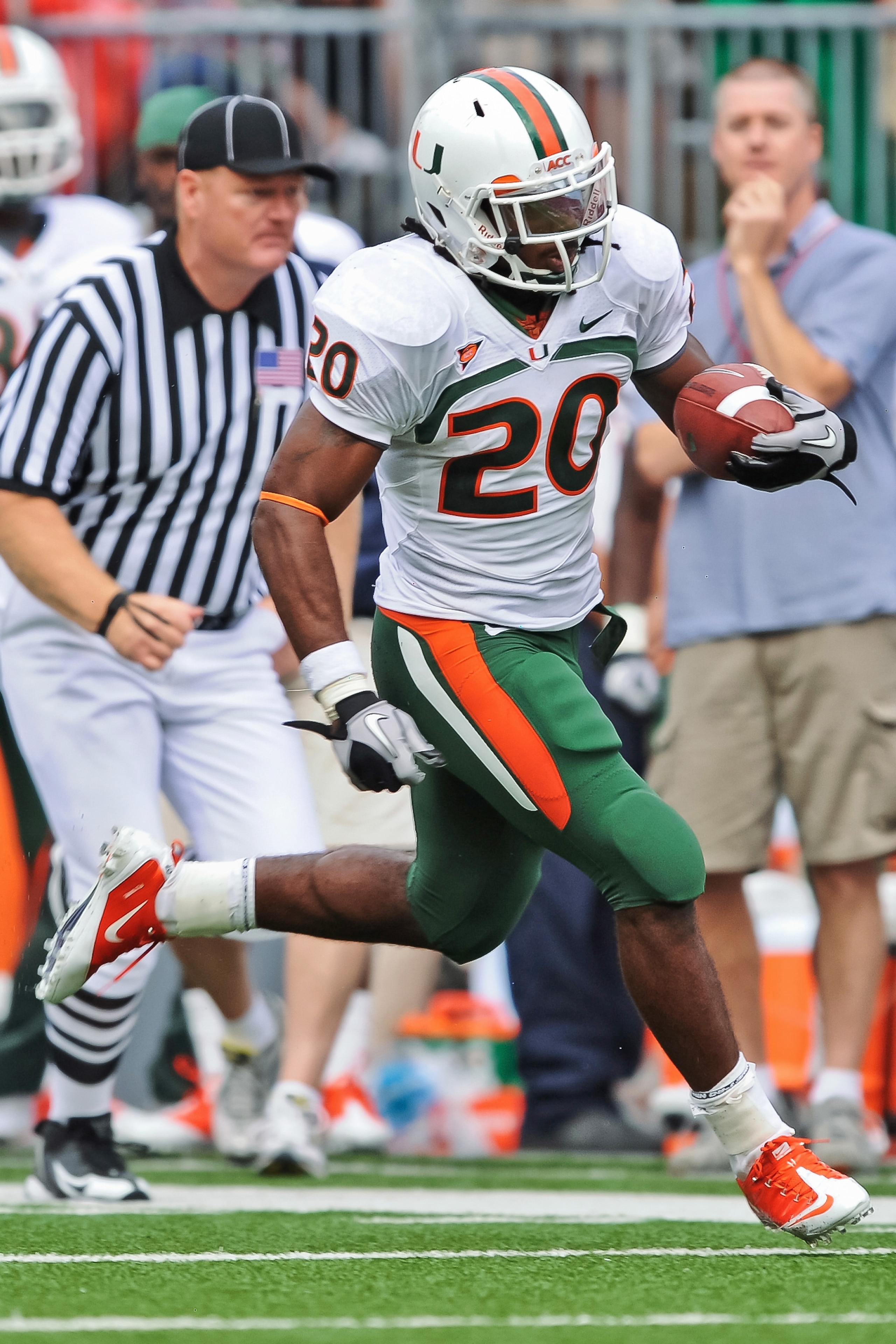 COLUMBUS, OH - SEPTEMBER 11:  Damien Berry #20 of the Miami Hurricanes runs with the ball against the Ohio State Buckeyes at Ohio Stadium on September 11, 2010 in Columbus, Ohio.  (Photo by Jamie Sabau/Getty Images)