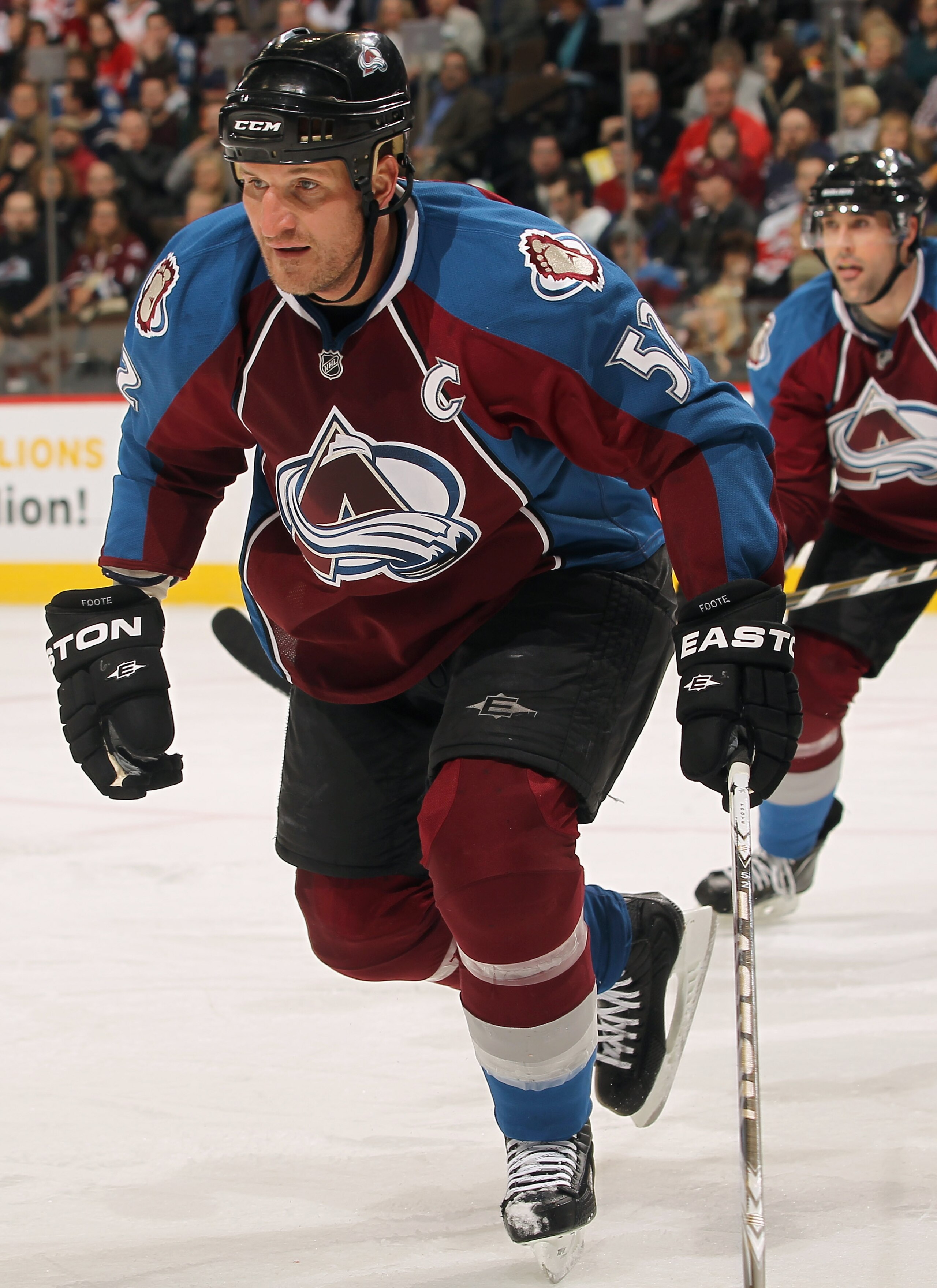DENVER - DECEMBER 27:  Adam Foote #52 of the Colorado Avalanche skates against the Detroit Red Wings at the Pepsi Center on December 27, 2010 in Denver, Colorado. The Red Wings defeated the Avalanche 4-3 in overtime.  (Photo by Doug Pensinger/Getty Images