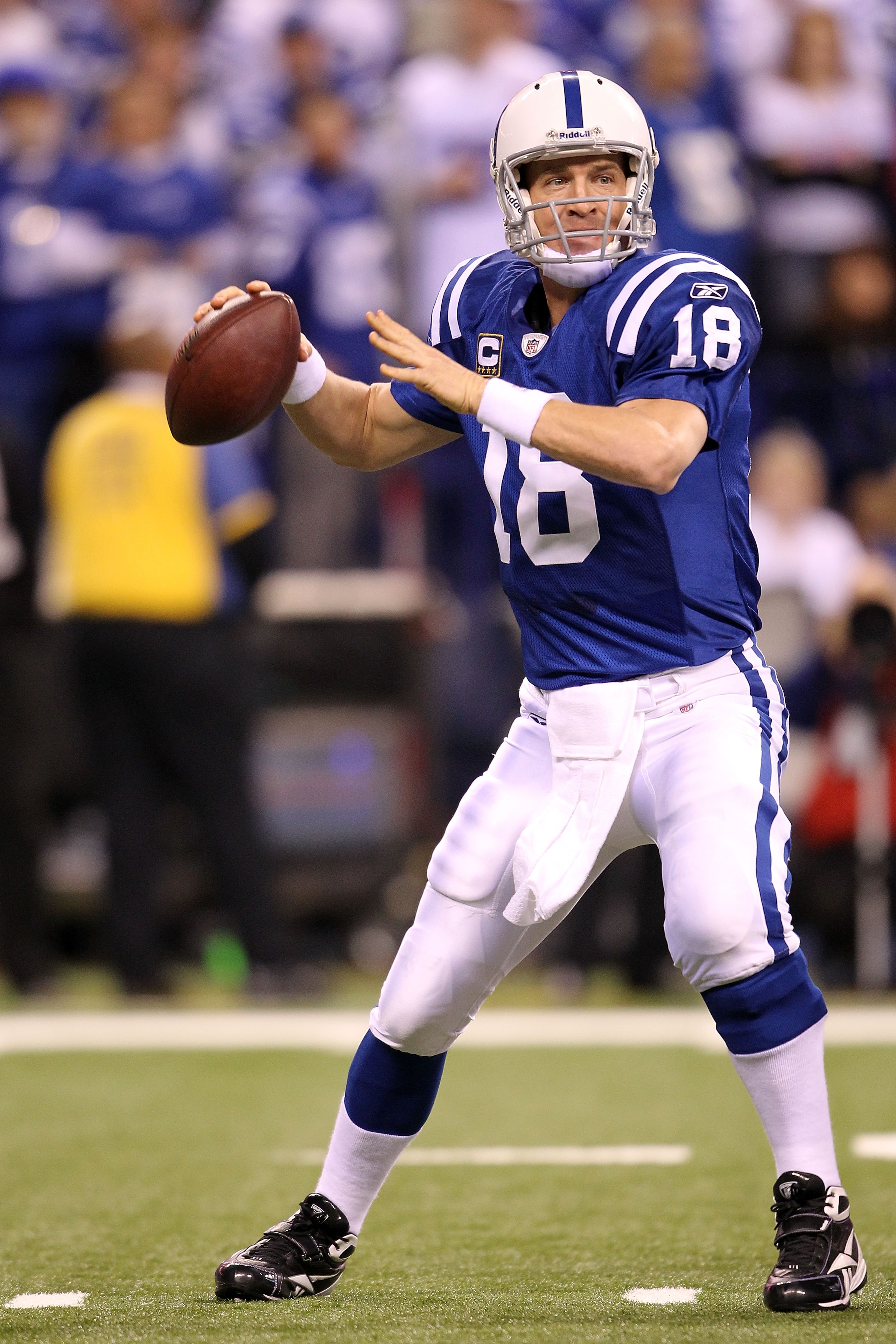 INDIANAPOLIS, IN - JANUARY 08: Quarterback Peyton Manning #18 of the Indianapolis Colts looks to pass against the New York Jets during their 2011 AFC wild card playoff game at Lucas Oil Stadium on January 8, 2011 in Indianapolis, Indiana. The Jets won 17 INDIANAPOLIS, IN - JANUARY 08: Quarterback Peyton Manning #18 of the Indianapolis Colts looks to pass against the New York Jets during their 2011 AFC wild card playoff game at Lucas Oil Stadium on January 8, 2011 in Indianapolis, Indiana. The Jets won 17