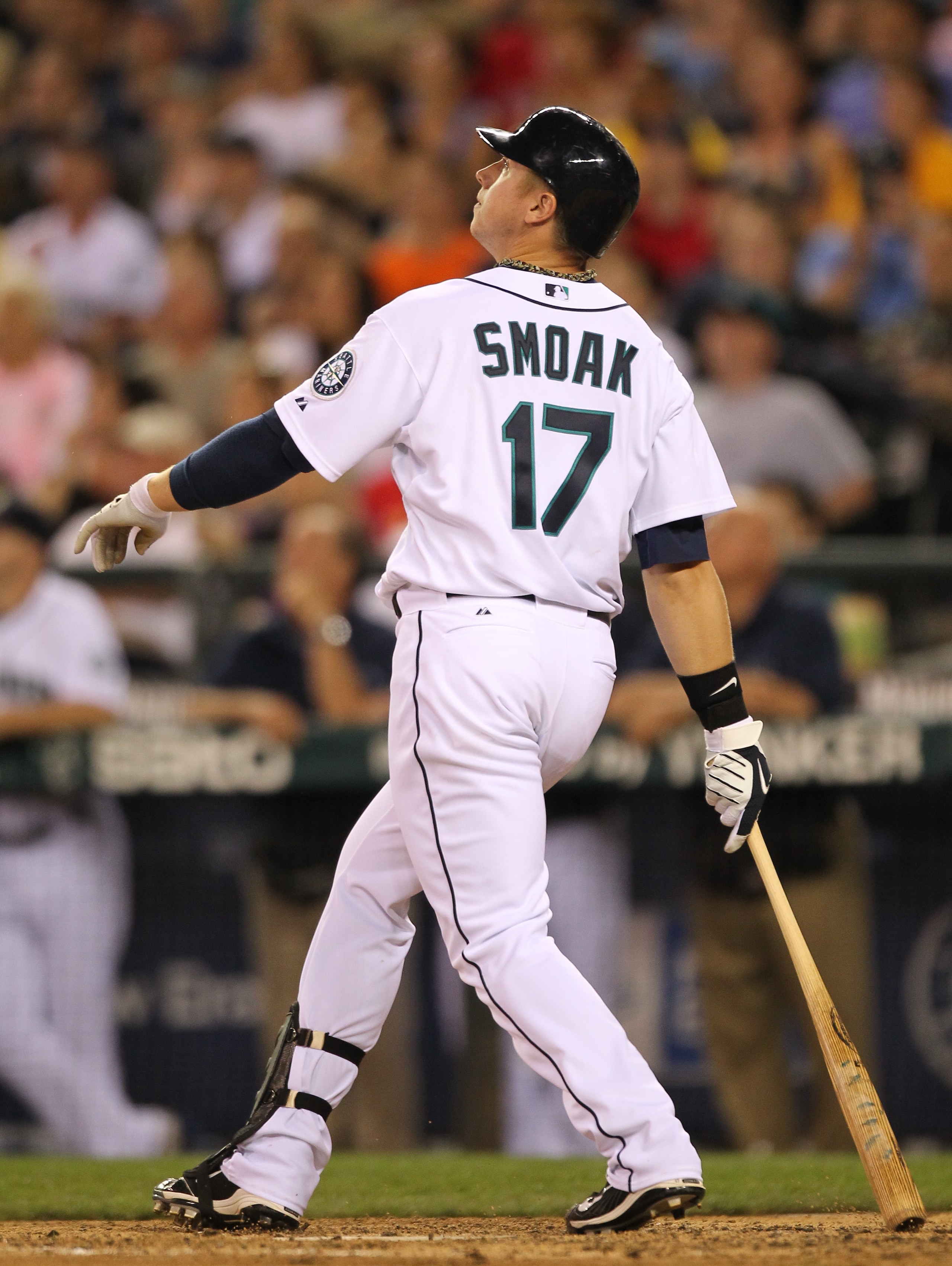 SEATTLE - JULY 24:  Justin Smoak #17 of the Seattle Mariners watches a deep fly ball out against the Boston Red Sox at Safeco Field on July 24, 2010 in Seattle, Washington. (Photo by Otto Greule Jr/Getty Images)