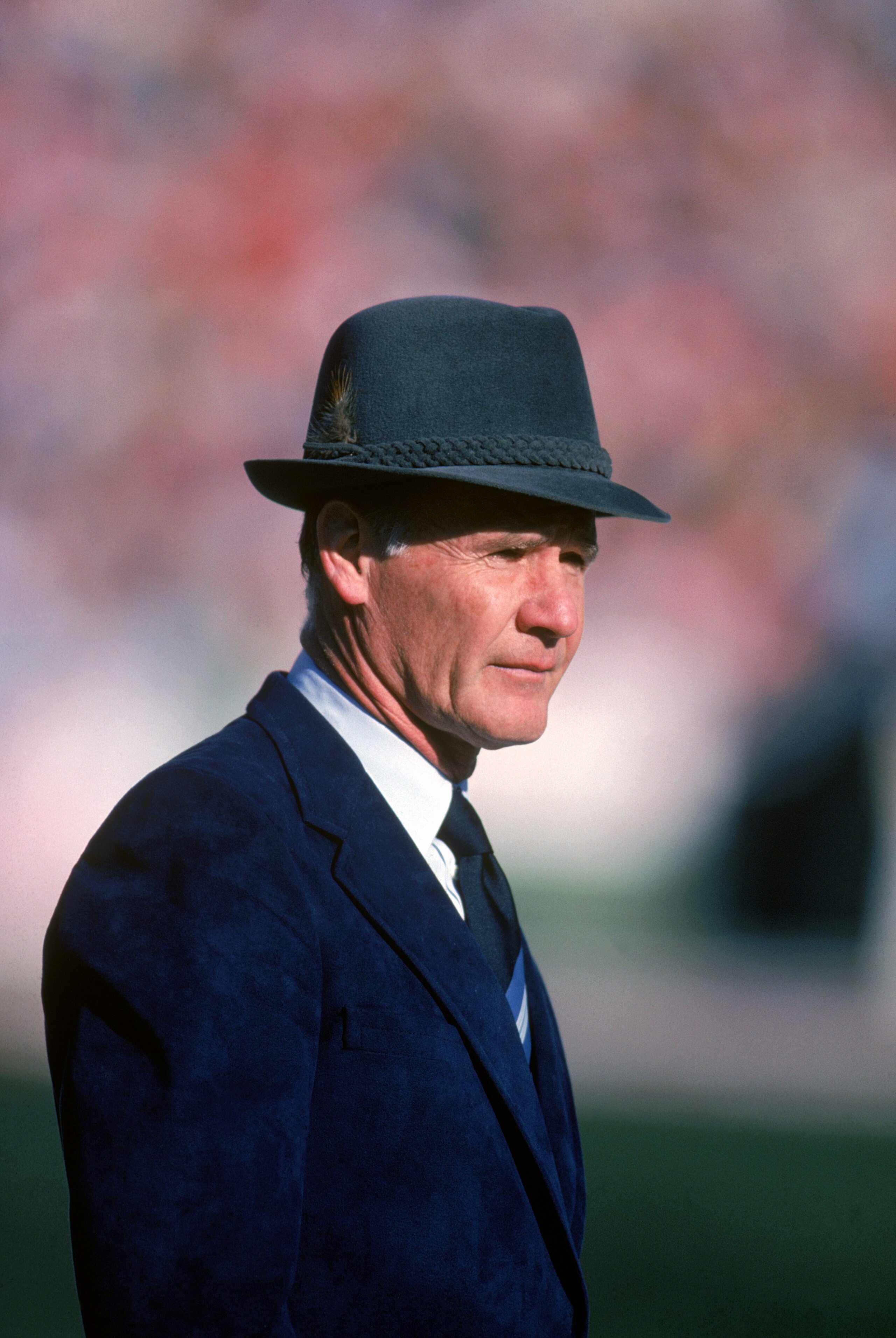 1983:  Head coach Tom Landry of the Dallas Cowboys watches from the sideline during a game in the 1988 season.  Tom Landry coached the Cowboys from 1960 to 1988, leading them to two Super Bowl victories.  (Photo by Getty Images)