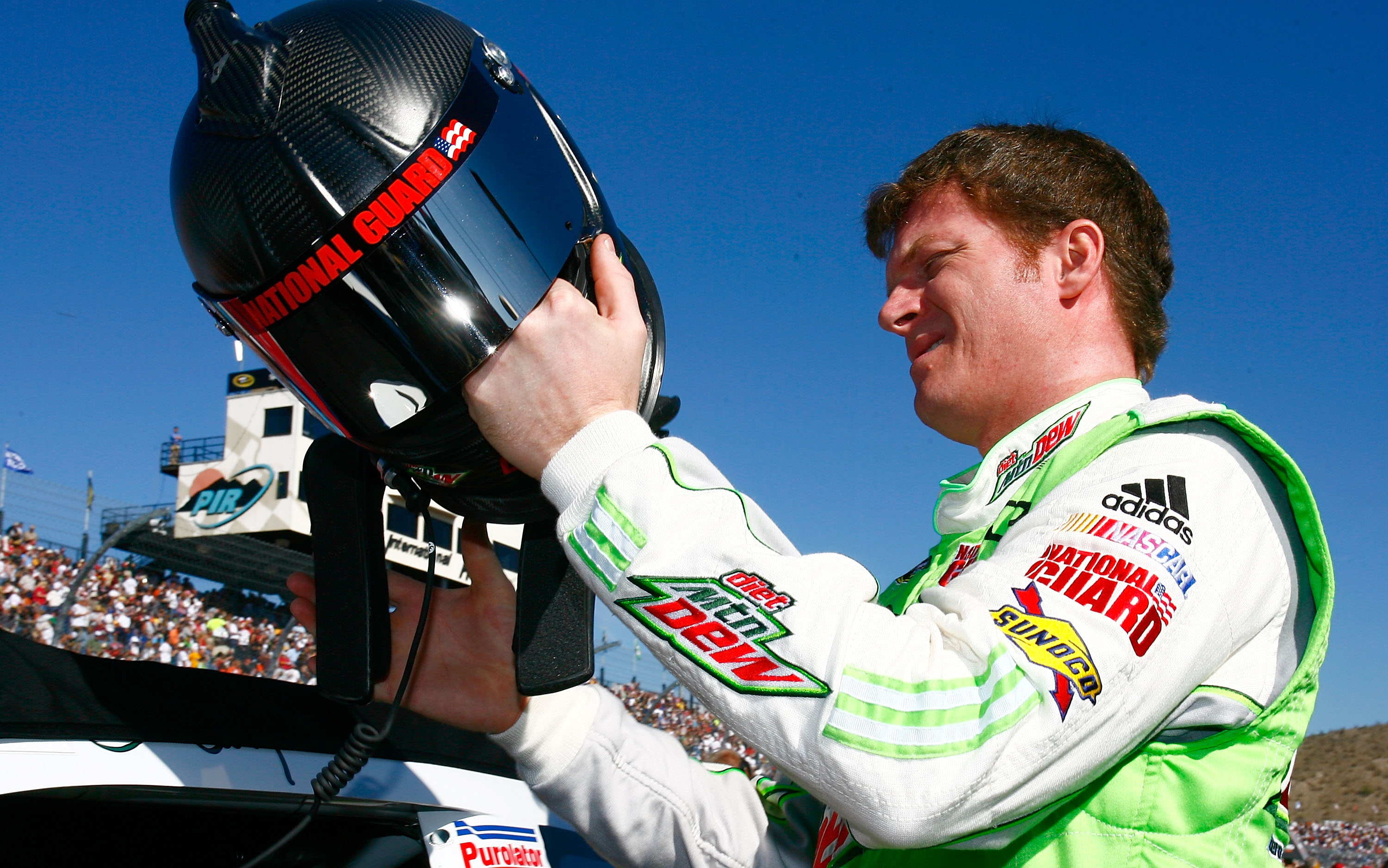 AVONDALE, AZ - NOVEMBER 14:  Dale Earnhardt Jr., driver of the #88 Diet Mountain Dew Chevrolet, prepares to drive prior to the NASCAR Sprint Cup Series Kobalt Tools 500 at Phoenix International Raceway on November 14, 2010 in Avondale, Arizona.  (Photo by
