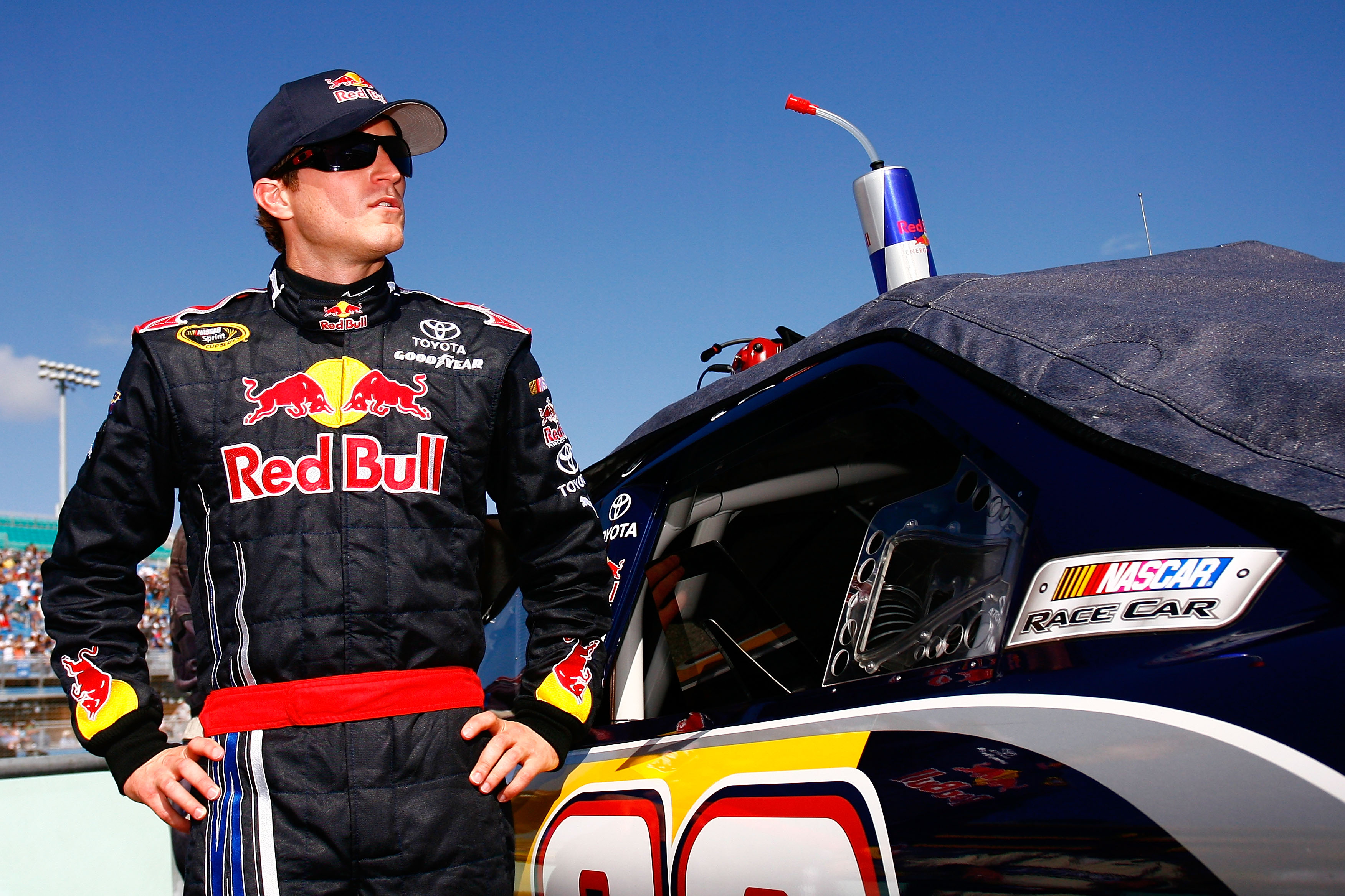 HOMESTEAD, FL - NOVEMBER 21:  Kasey Kahne, driver of the #83 Red Bull Toyota, stands by his car prior to the NASCAR Sprint Cup Series Ford 400 at Homestead-Miami Speedway on November 21, 2010 in Homestead, Florida.  (Photo by Jason Smith/Getty Images for