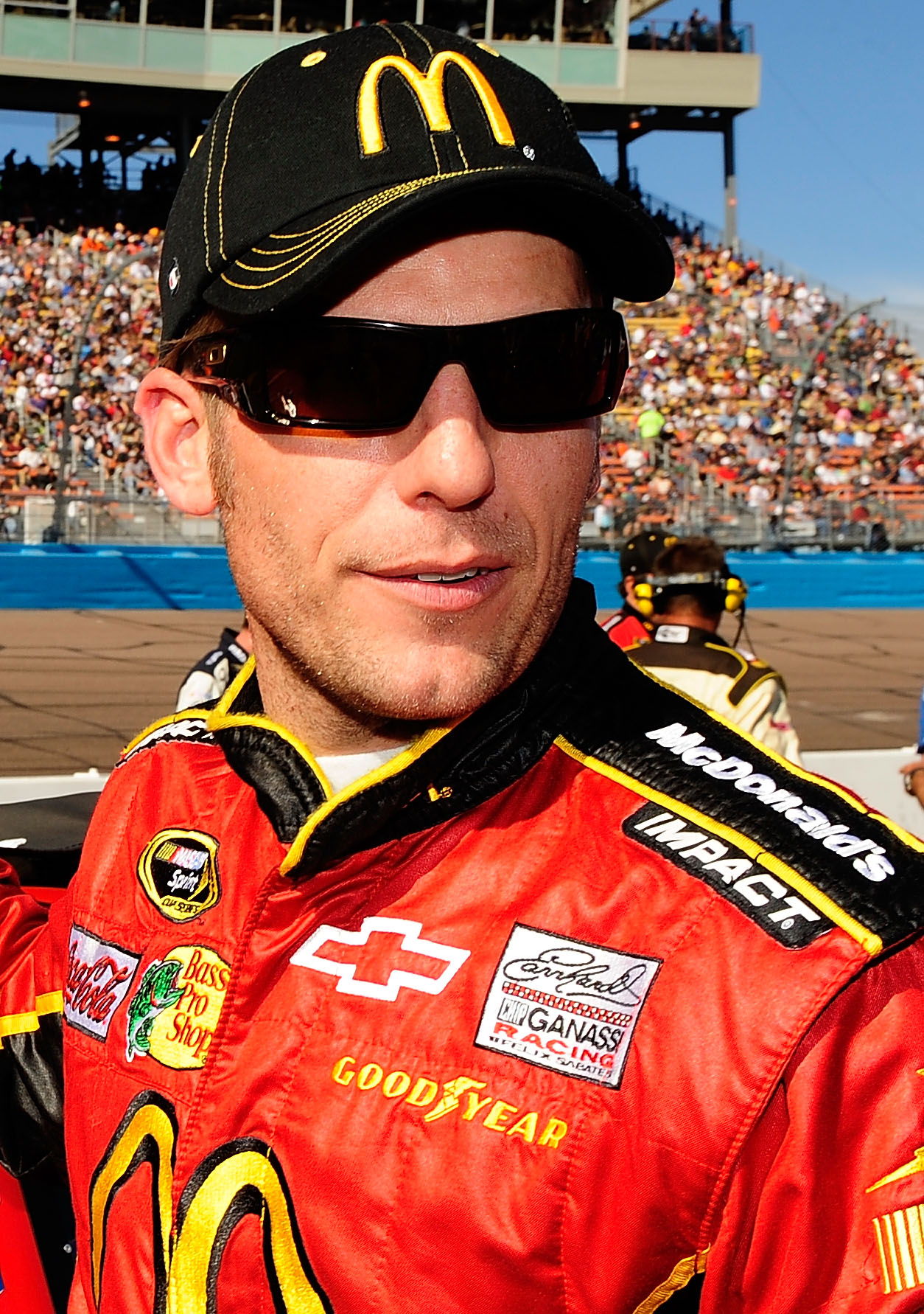 AVONDALE, AZ - NOVEMBER 14:  Jamie McMurray, driver of the #1 McDonald's Chevrolet, stands on the starting grid prior to the NASCAR Sprint Cup Series Kobalt Tools 500 at Phoenix International Raceway on November 14, 2010 in Avondale, Arizona.  (Photo by R