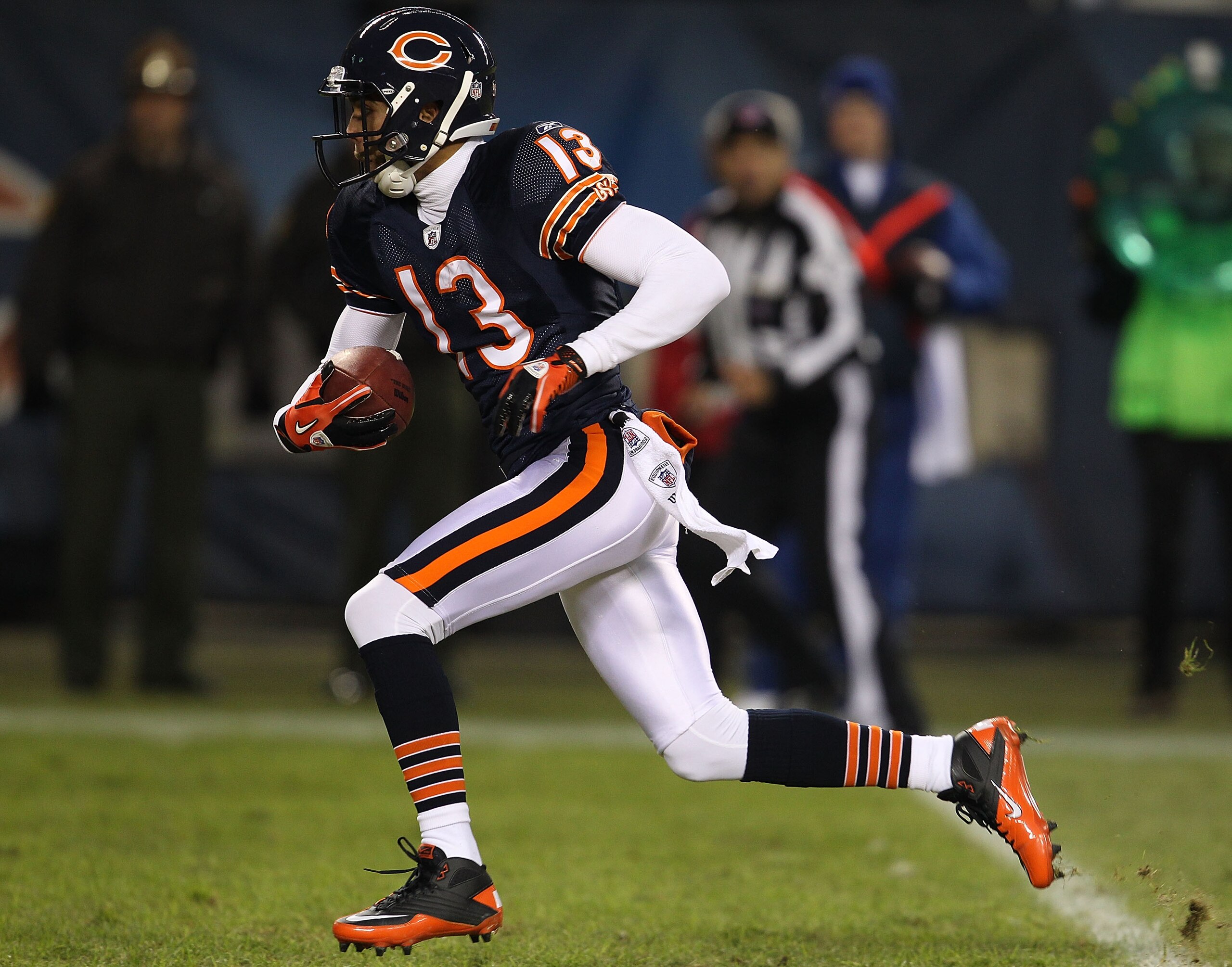CHICAGO - NOVEMBER 28: Johnny Knox #13 of the Chicago Bears runs for a first down against the Philadelphia Eagles at Soldier Field on November 28, 2010 in Chicago, Illinois. The Bears defeated the Eagles 31-26. (Photo by Jonathan Daniel/Getty Images)