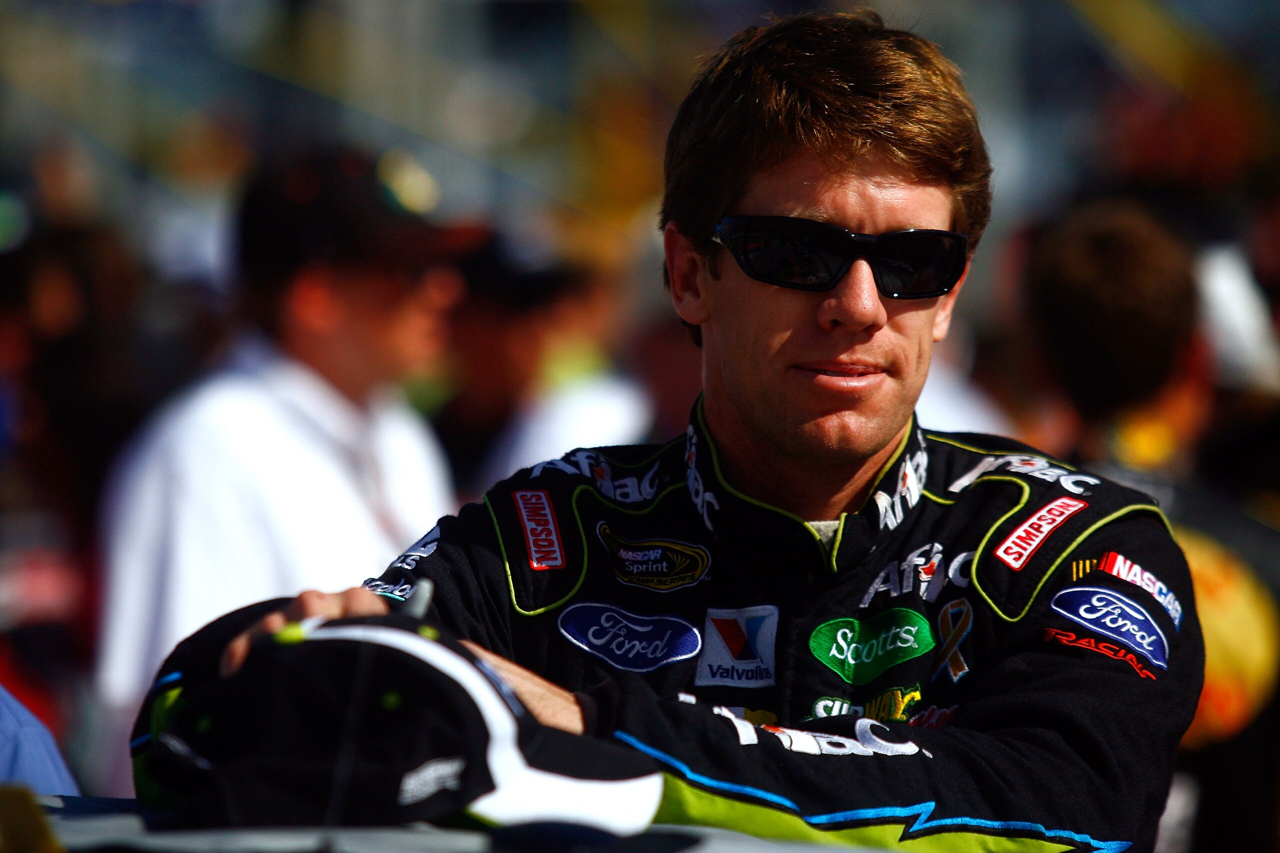 HOMESTEAD, FL - NOVEMBER 21:  Carl Edwards, driver of the #99 Aflac Ford, stands on pit road prior to the NASCAR Sprint Cup Series Ford 400 at Homestead-Miami Speedway on November 21, 2010 in Homestead, Florida.  (Photo by Jason Smith/Getty Images for NAS