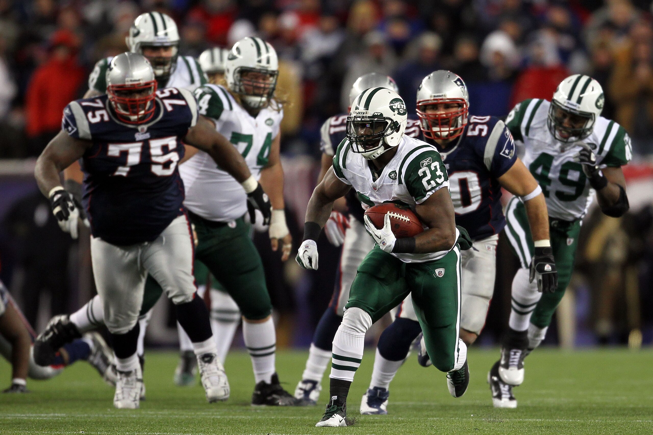 FOXBORO, MA - JANUARY 16:  Shonn Greene #23 of the New York Jets runs down field against the New England Patriots during their 2011 AFC divisional playoff game at Gillette Stadium on January 16, 2011 in Foxboro, Massachusetts.  (Photo by Jim Rogash/Getty