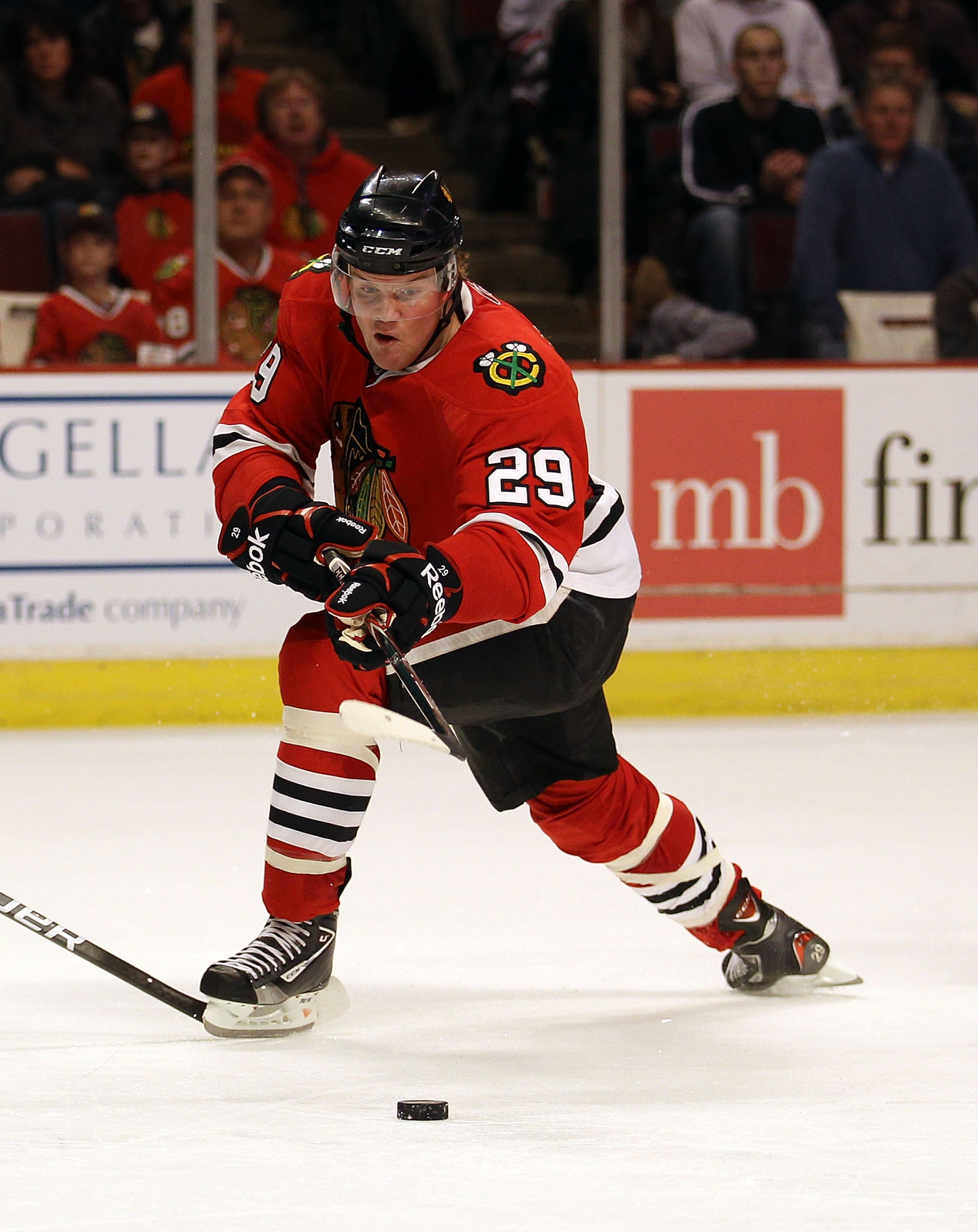 CHICAGO, IL - JANUARY 09: Bryan Bickell #29 of the Chicago Blackhawks breaks to the puck against the New York Islanders at the United Center on January 9, 2011 in Chicago, Illinois. The Blackhawks defeated the Islanders 5-0. (Photo by Jonathan Daniel/Gett