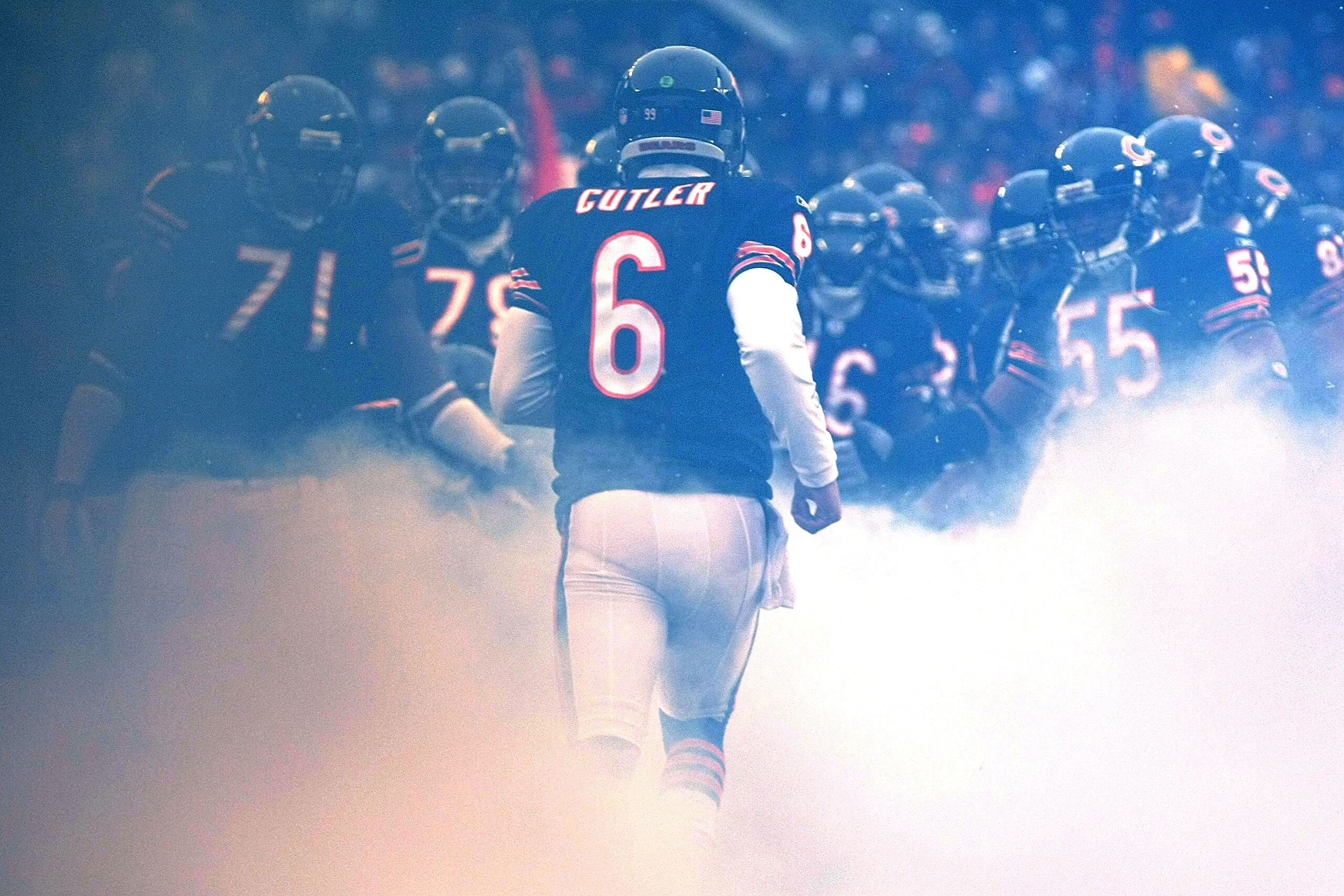 CHICAGO, IL - JANUARY 16:  Quarterback Jay Cutler #6 of the Chicago Bears runs out of the tunnel during player introductions before taking on the Seattle Seahawks in the 2011 NFC divisional playoff game at Soldier Field on January 16, 2011 in Chicago, Ill