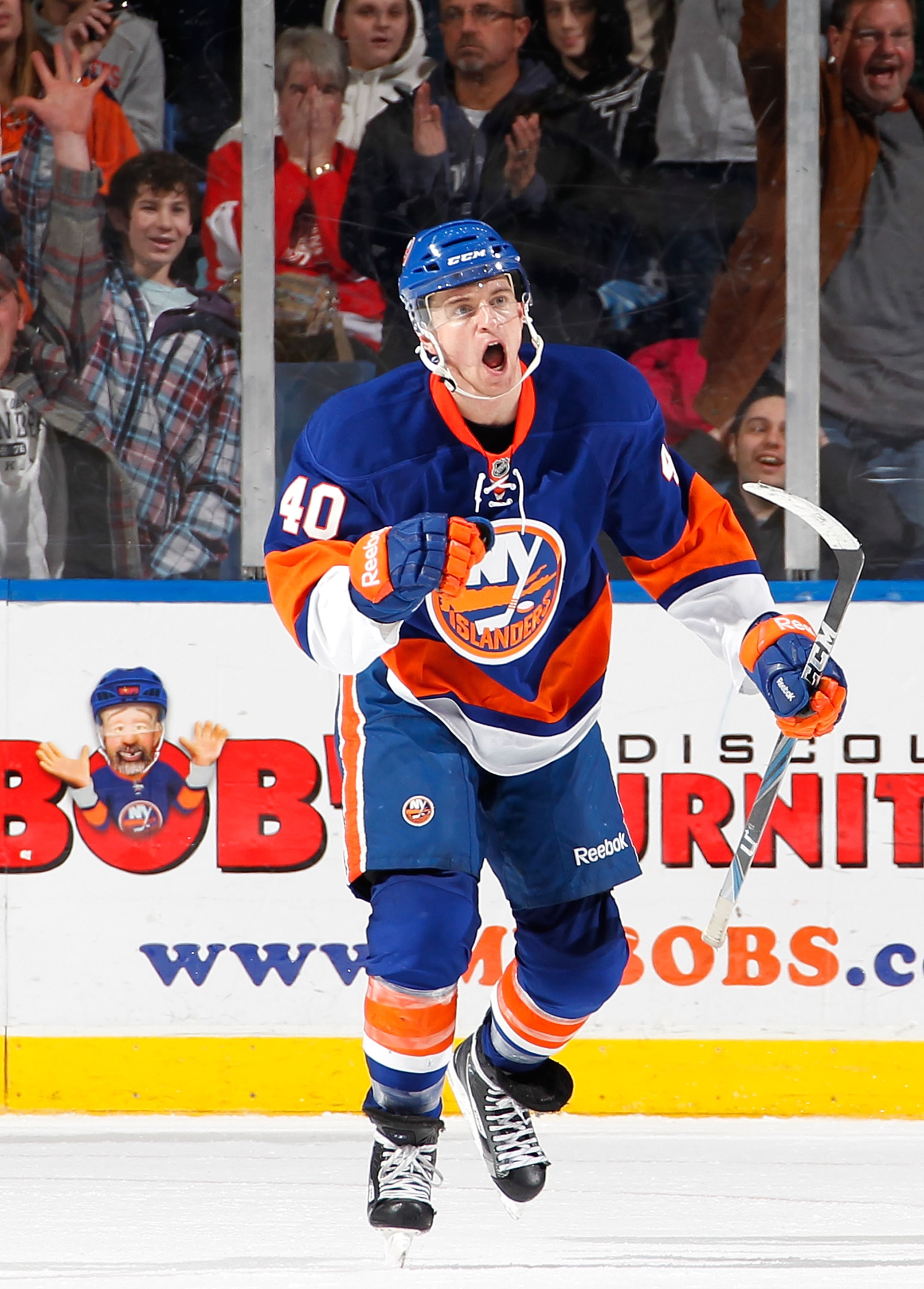 UNIONDALE, NY - JANUARY 11:  Michael Grabner #40 of the New York Islanders celebrates an Islanders goal during an NHL game against the Vancouver Canucks at the Nassau Coliseum on January 11, 2011 in Uniondale, New York.  (Photo by Paul Bereswill/Getty Ima