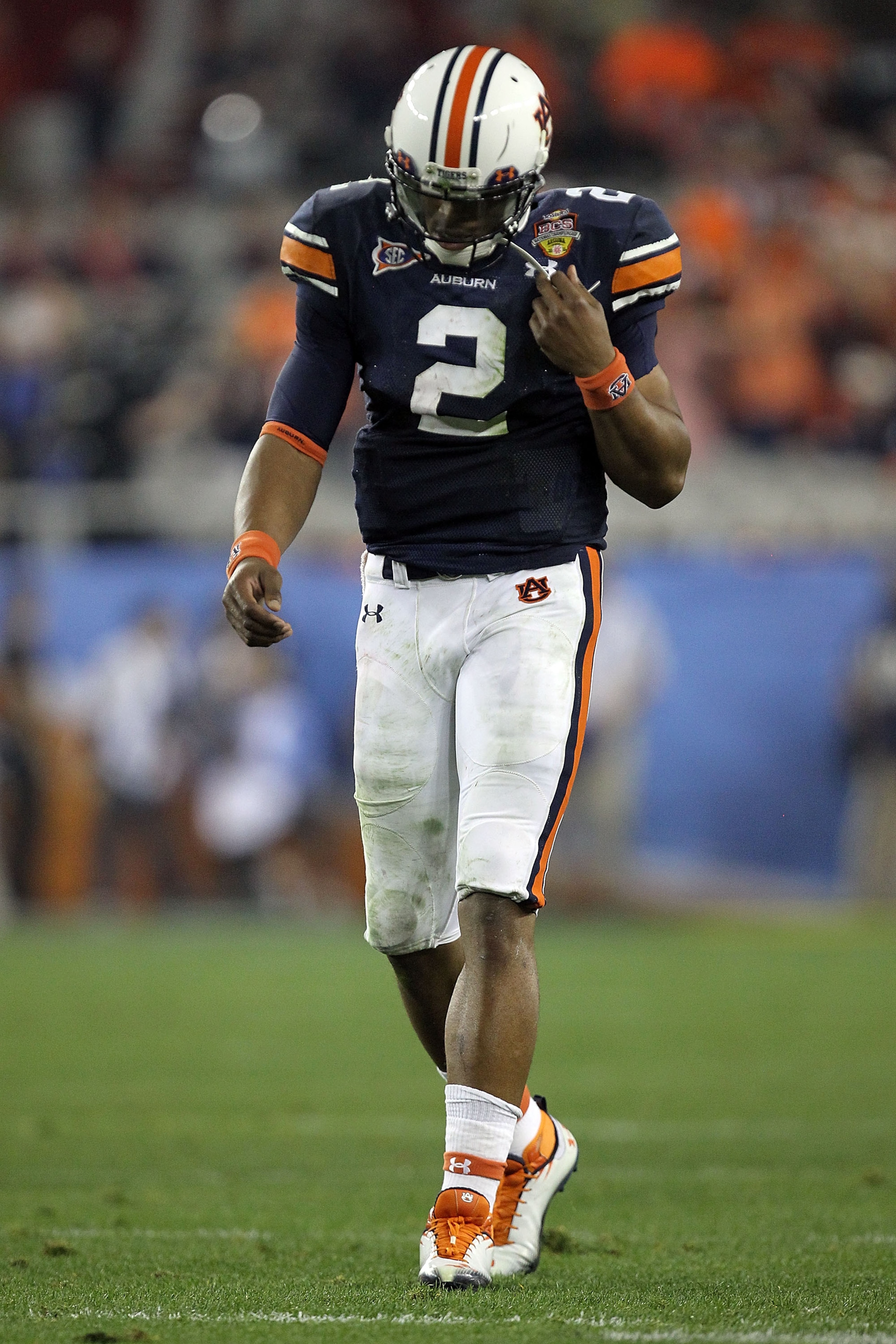 GLENDALE, AZ - JANUARY 10: Quarterback Cameron Newton #2 of the Auburn Tigers walks off the field in the second quarter against the Oregon Ducks during the Tostitos BCS National Championship Game at University of Phoenix Stadium on January 10, 2011 in Gl GLENDALE, AZ - JANUARY 10: Quarterback Cameron Newton #2 of the Auburn Tigers walks off the field in the second quarter against the Oregon Ducks during the Tostitos BCS National Championship Game at University of Phoenix Stadium on January 10, 2011 in Gl