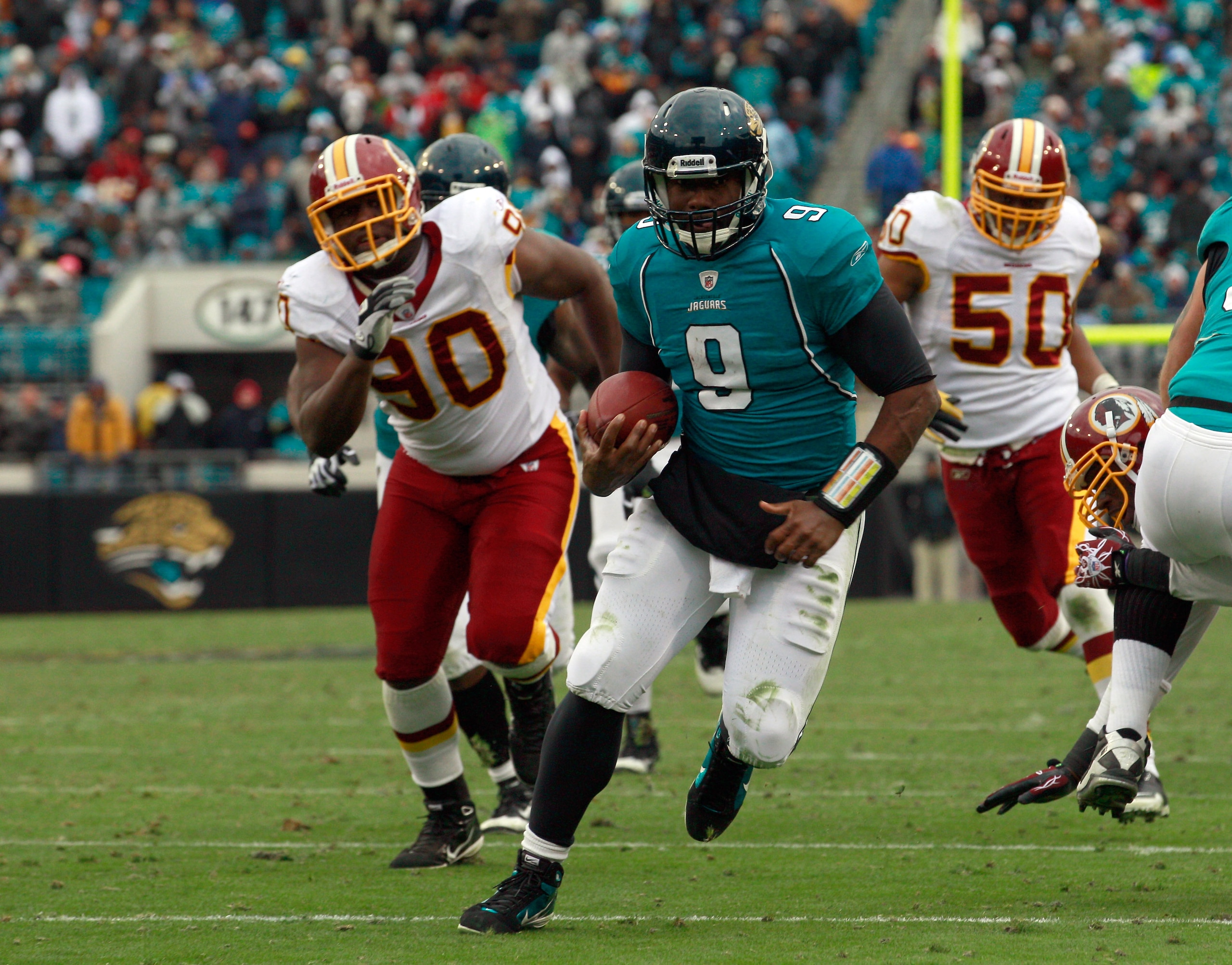 JACKSONVILLE, FL - DECEMBER 26: Quarterback David Garrard #9 of the Jacksonville Jaguars runs for a touchdaown during the game against the Washington Redskins at EverBank Field on December 26, 2010 in Jacksonville, Florida. (Photo by Sam Greenwood/Getty JACKSONVILLE, FL - DECEMBER 26: Quarterback David Garrard #9 of the Jacksonville Jaguars runs for a touchdaown during the game against the Washington Redskins at EverBank Field on December 26, 2010 in Jacksonville, Florida. (Photo by Sam Greenwood/Getty
