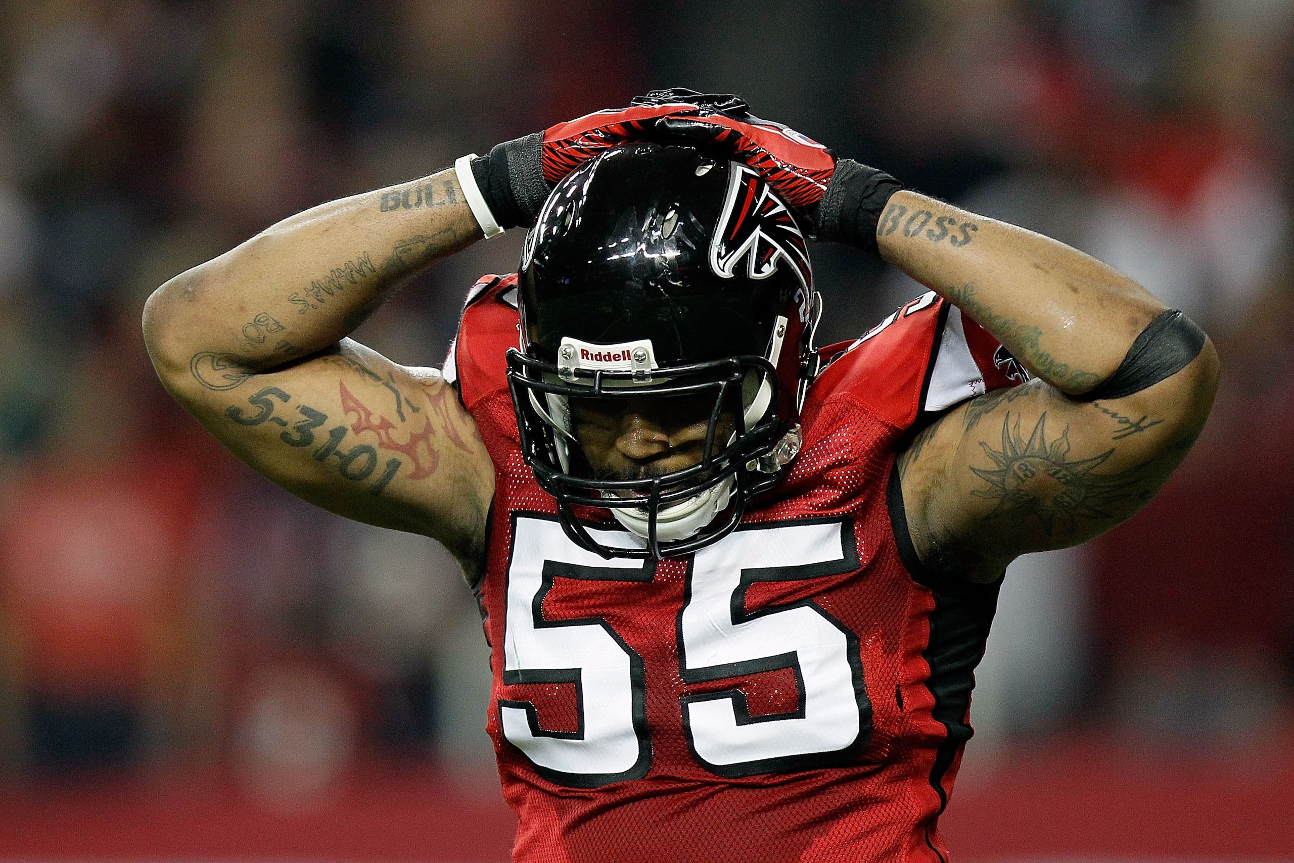 ATLANTA, GA - JANUARY 15:  John Abraham #5 of the Atlanta Falcons reacts against the Green Bay Packers during their 2011 NFC divisional playoff game at Georgia Dome on January 15, 2011 in Atlanta, Georgia.  (Photo by Kevin C. Cox/Getty Images)