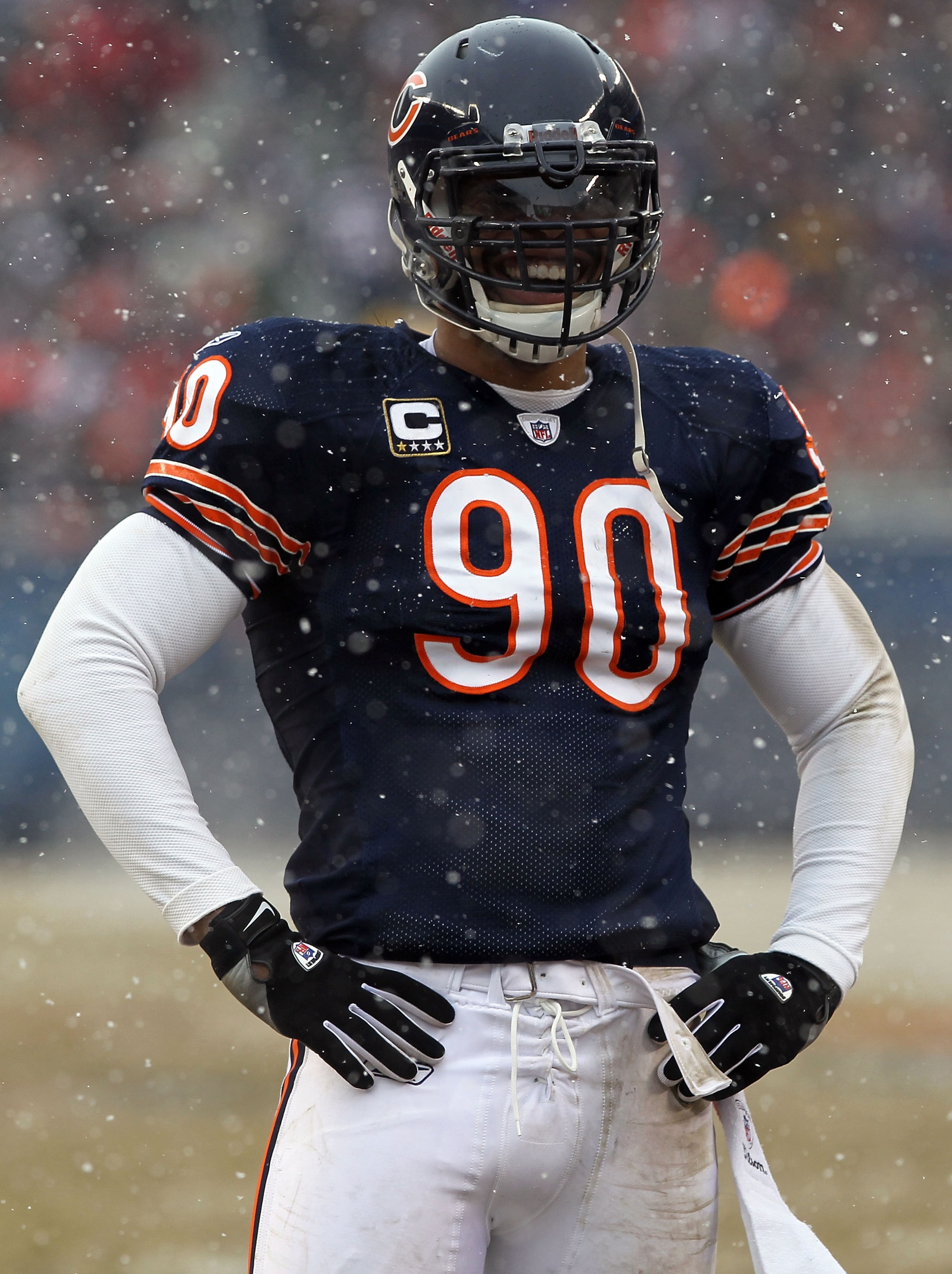 CHICAGO, IL - JANUARY 16:  Julius Peppers #90 of the Chicago Bears smiles in the first half against the Seattle Seahawks in the 2011 NFC divisional playoff game at Soldier Field on January 16, 2011 in Chicago, Illinois.  (Photo by Doug Pensinger/Getty Ima