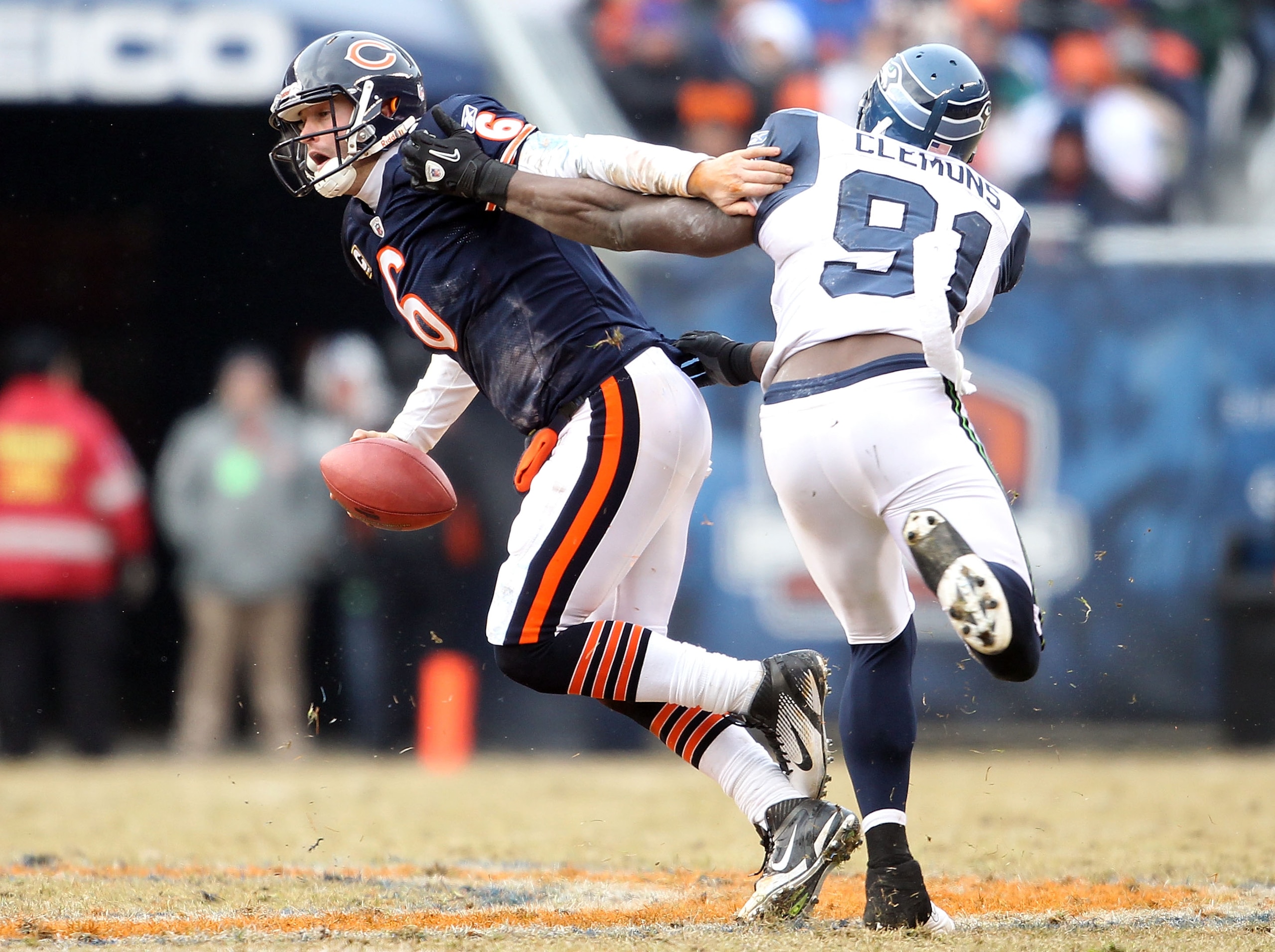 CHICAGO, IL - JANUARY 16: Quarterback Jay Cutler #6 of the Chicago Bears attempts to avoid a sack by Chris Clemons #91 of the Seattle Seahawks in the second half of the 2011 NFC divisional playoff game at Soldier Field on January 16, 2011 in Chicago, Ill CHICAGO, IL - JANUARY 16: Quarterback Jay Cutler #6 of the Chicago Bears attempts to avoid a sack by Chris Clemons #91 of the Seattle Seahawks in the second half of the 2011 NFC divisional playoff game at Soldier Field on January 16, 2011 in Chicago, Ill