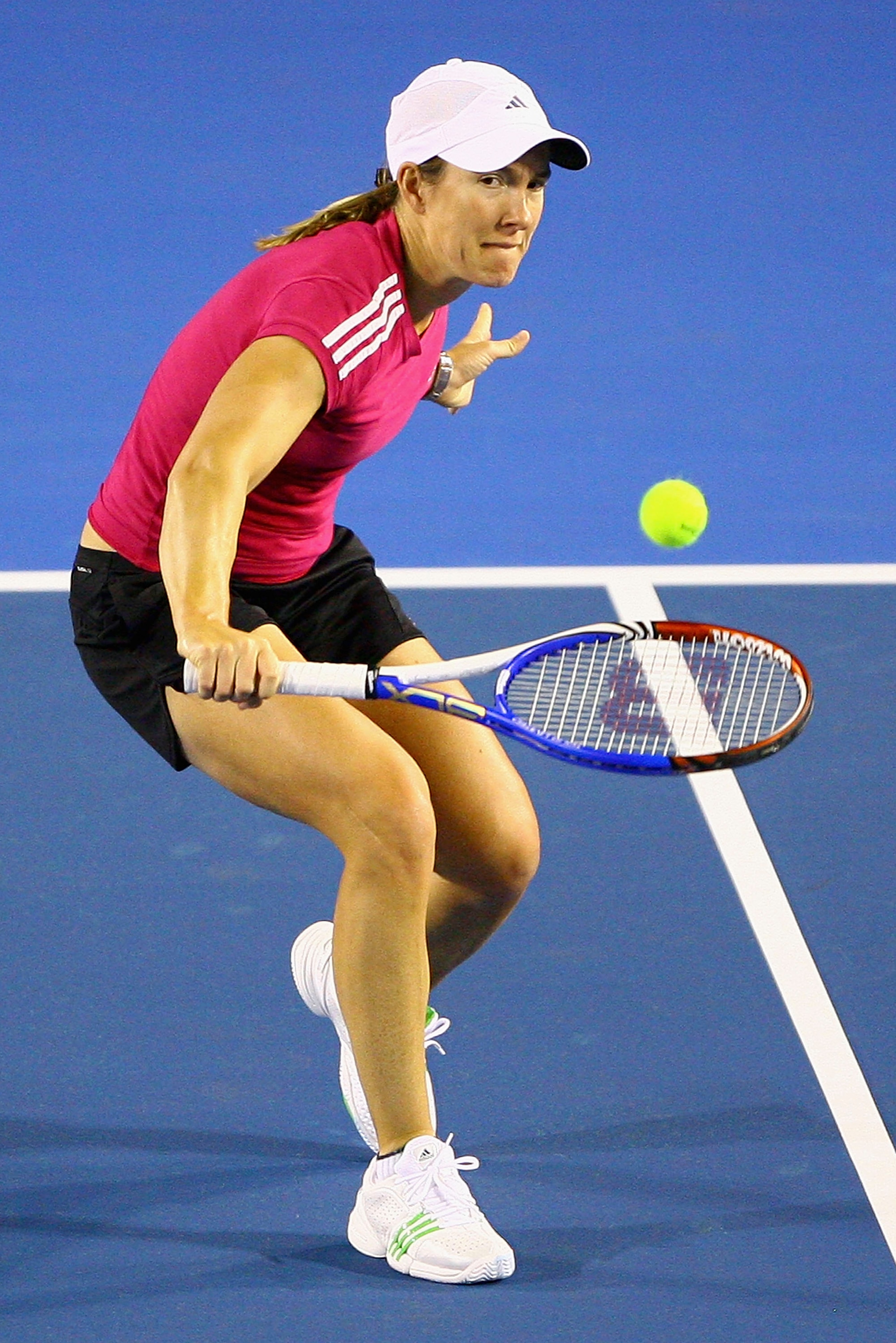 MELBOURNE, AUSTRALIA - JANUARY 10: Justine Henin of Belgium plays a backhand during a practice session ahead of the 2011 Australian Open at Melbourne Park on January 10, 2011 in Melbourne, Australia. (Photo by Robert Prezioso/Getty Images) MELBOURNE, AUSTRALIA - JANUARY 10: Justine Henin of Belgium plays a backhand during a practice session ahead of the 2011 Australian Open at Melbourne Park on January 10, 2011 in Melbourne, Australia. (Photo by Robert Prezioso/Getty Images)