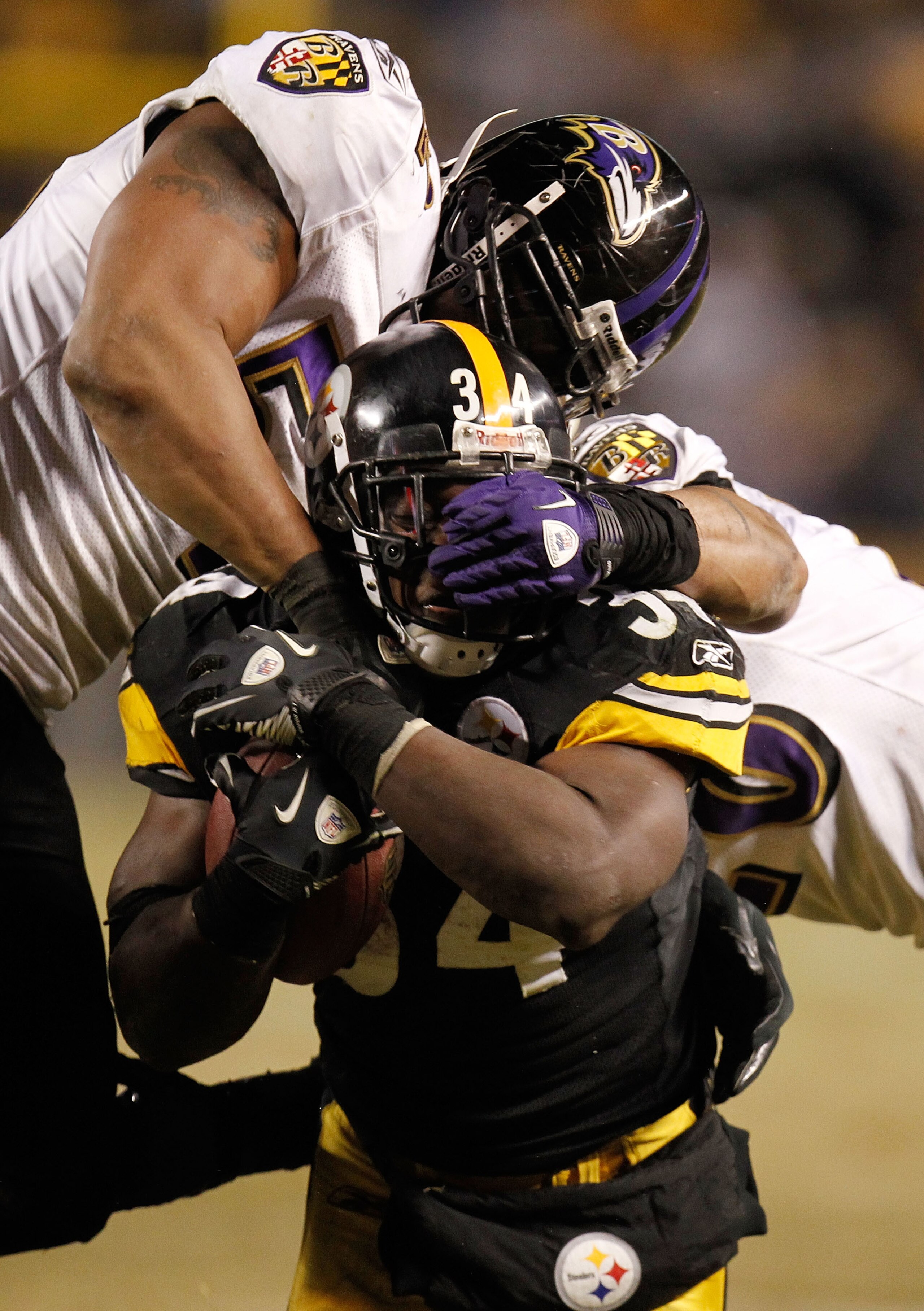 PITTSBURGH, PA - JANUARY 15: Running back Rashard Mendenhall #34 of the Pittsburgh Steelers is tackled by the Baltimore Ravens during the AFC Divisional Playoff Game at Heinz Field on January 15, 2011 in Pittsburgh, Pennsylvania. (Photo by Gregory Shamu PITTSBURGH, PA - JANUARY 15: Running back Rashard Mendenhall #34 of the Pittsburgh Steelers is tackled by the Baltimore Ravens during the AFC Divisional Playoff Game at Heinz Field on January 15, 2011 in Pittsburgh, Pennsylvania. (Photo by Gregory Shamu