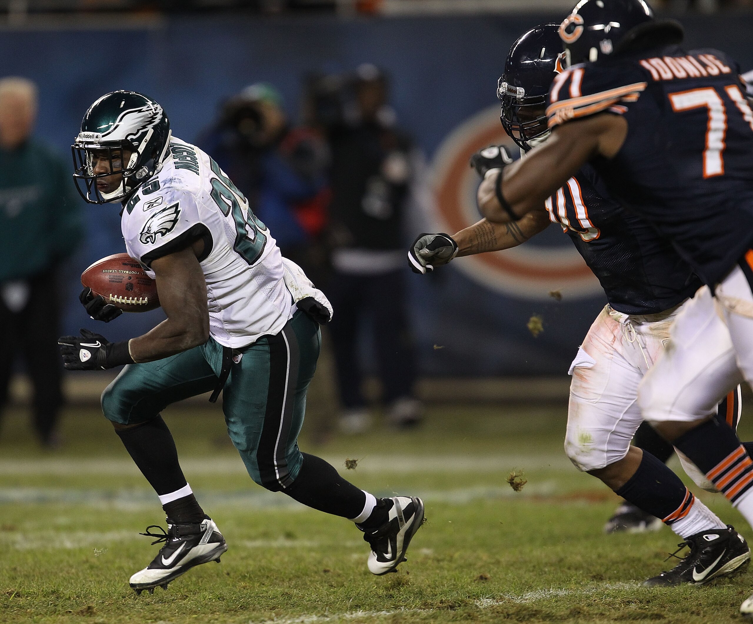 CHICAGO - NOVEMBER 28: LeSean McCoy #25 of the Philadelphia Eagles tries to escape Julius Peppers #90 and Israel Idonije #71 of the Chicago Bears at Soldier Field on November 28, 2010 in Chicago, Illinois. The Bears defeated the Eagles 31-26. (Photo by Jo