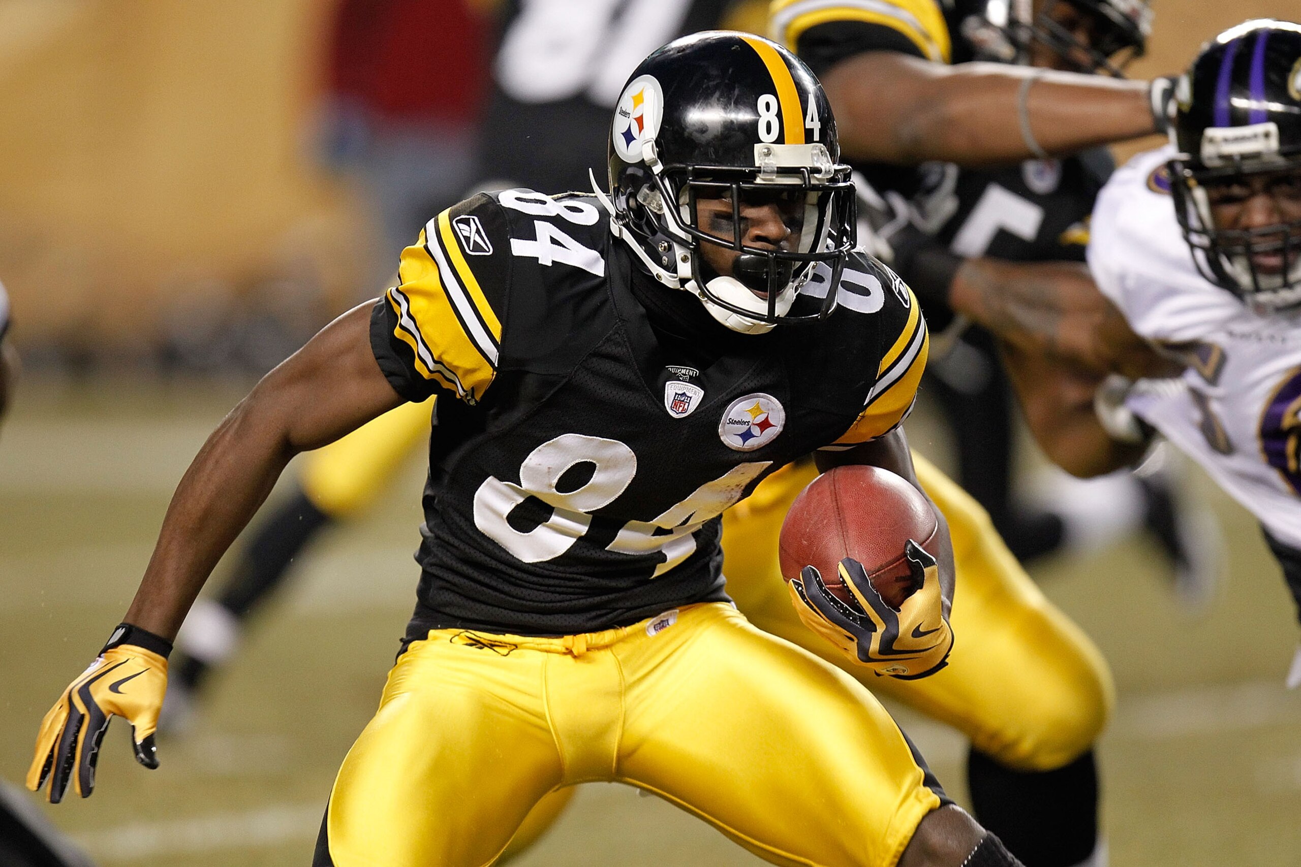 PITTSBURGH, PA - JANUARY 15: Wide receiver Antonio Brown #84 of the Pittsburgh Steelers runs with the ball after a catch against the Baltimore Ravens in the AFC Divisional Playoff Game at Heinz Field on January 15, 2011 in Pittsburgh, Pennsylvania. (Pho PITTSBURGH, PA - JANUARY 15: Wide receiver Antonio Brown #84 of the Pittsburgh Steelers runs with the ball after a catch against the Baltimore Ravens in the AFC Divisional Playoff Game at Heinz Field on January 15, 2011 in Pittsburgh, Pennsylvania. (Pho