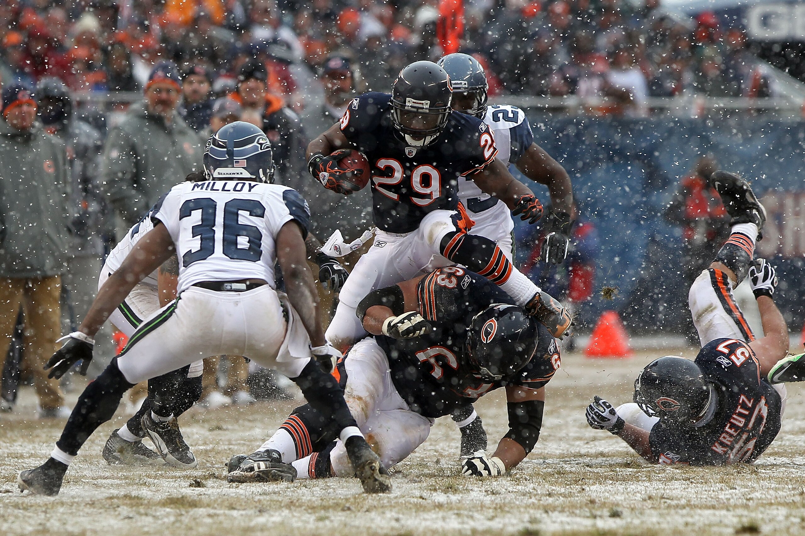 CHICAGO, IL - JANUARY 16: Running back Chester Taylor #29 of the Chicago Bears leaps as he runs the ball against the Seattle Seahawks in the second quarter in the 2011 NFC divisional playoff game at Soldier Field on January 16, 2011 in Chicago, Illinois. CHICAGO, IL - JANUARY 16: Running back Chester Taylor #29 of the Chicago Bears leaps as he runs the ball against the Seattle Seahawks in the second quarter in the 2011 NFC divisional playoff game at Soldier Field on January 16, 2011 in Chicago, Illinois.