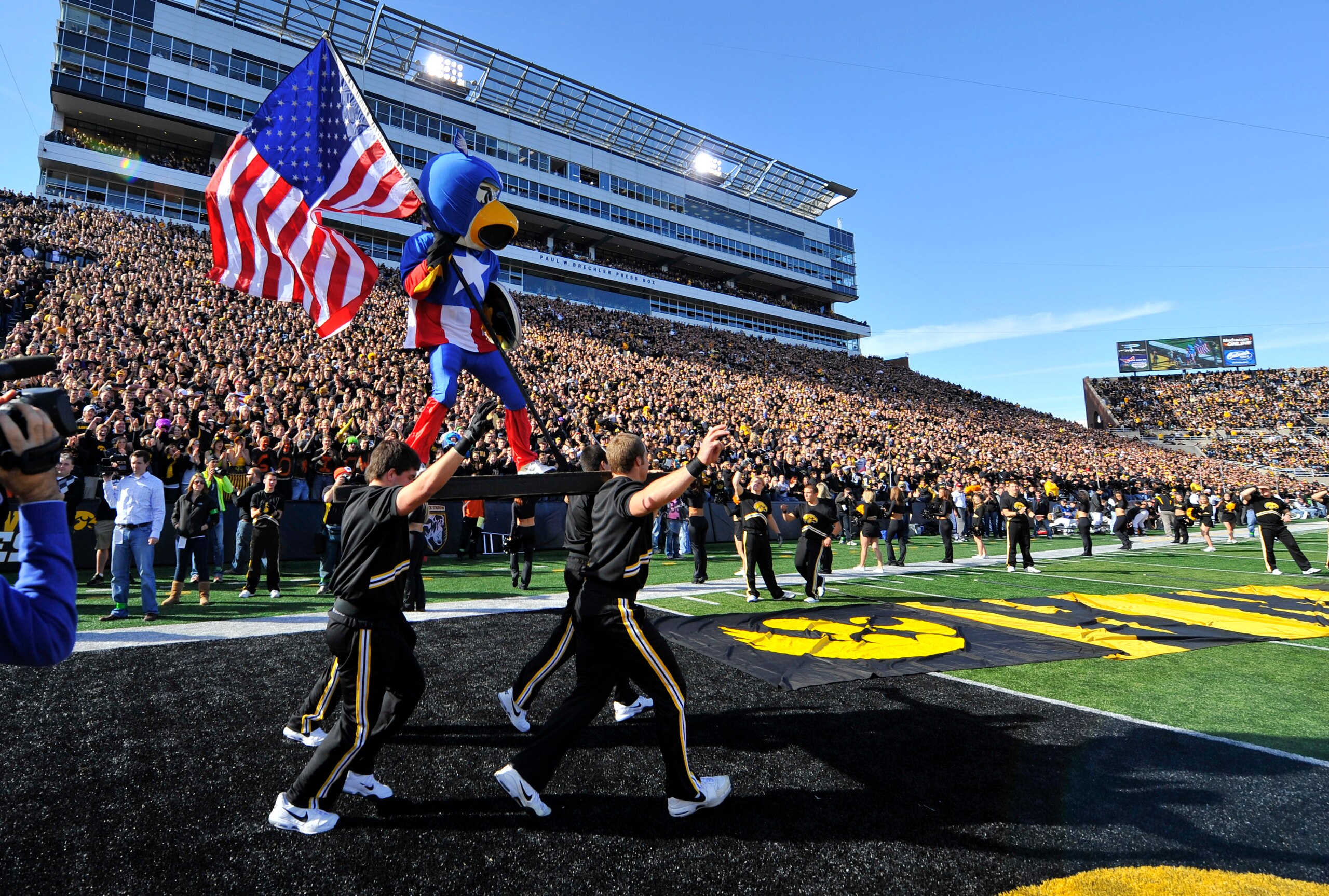 IOWA CITY, IA - OCTOBER 30- Dressed as Captain American Univeristy of Iowa mascot Herky the Hawk takes the field for the Michigan State Spartans NCAA football game at Kinnick Stadium on October 30, 2010 in Iowa City, Iowa. Iowa won 37-6 over Michigan Stat