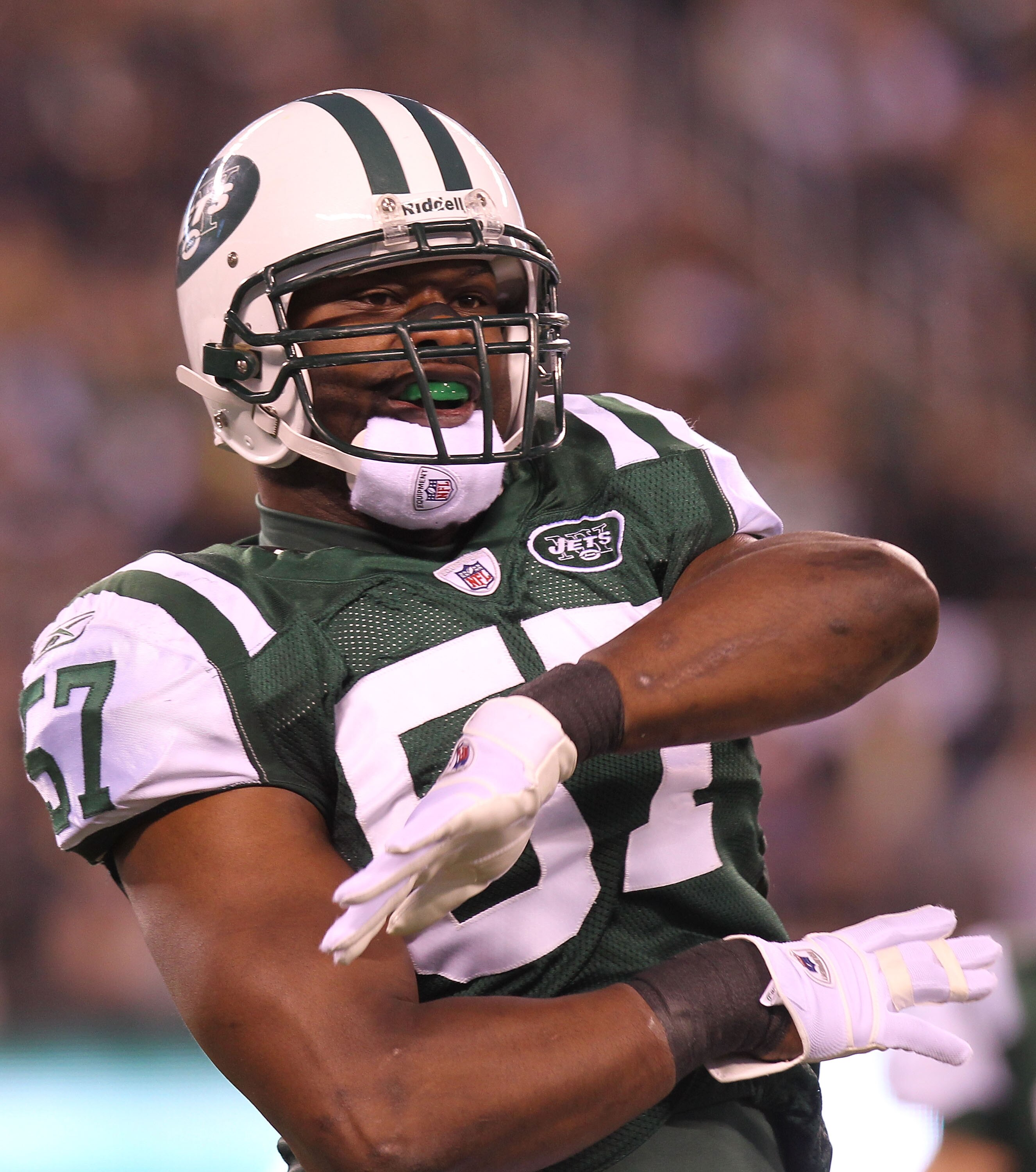 EAST RUTHERFORD, NJ - DECEMBER 12: Bart Scott #57 of the New York Jets reacts the Miami Dolphins at New Meadowlands Stadium on December 12, 2010 in East Rutherford, New Jersey. (Photo by Nick Laham/Getty Images) EAST RUTHERFORD, NJ - DECEMBER 12: Bart Scott #57 of the New York Jets reacts the Miami Dolphins at New Meadowlands Stadium on December 12, 2010 in East Rutherford, New Jersey. (Photo by Nick Laham/Getty Images)