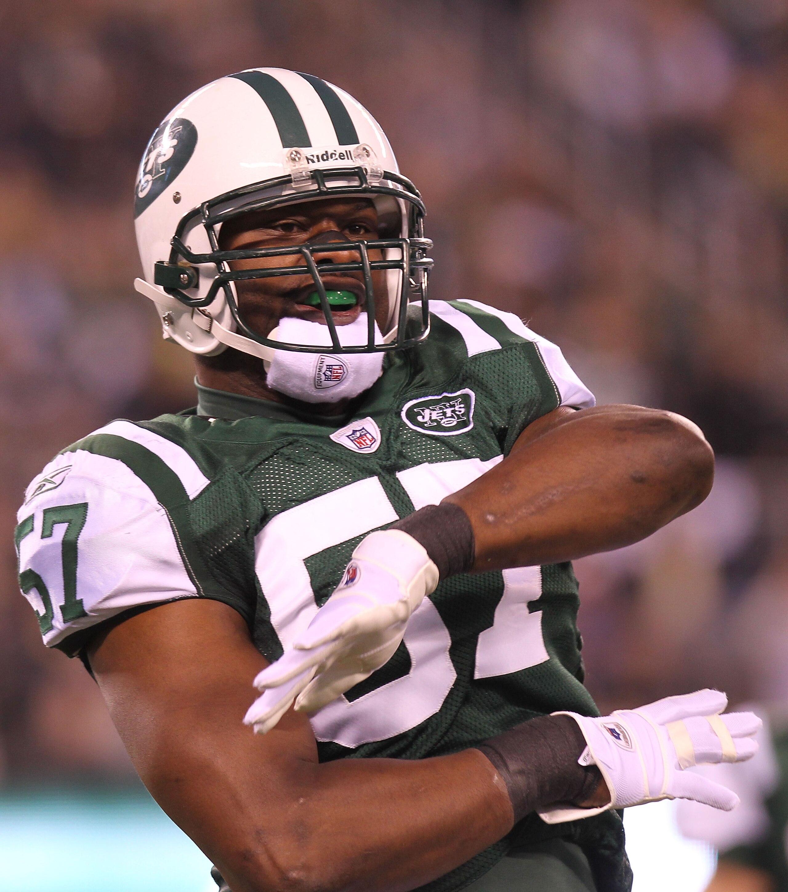 EAST RUTHERFORD, NJ - DECEMBER 12: Bart Scott #57 of the New York Jets reacts the Miami Dolphins at New Meadowlands Stadium on December 12, 2010 in East Rutherford, New Jersey. (Photo by Nick Laham/Getty Images) EAST RUTHERFORD, NJ - DECEMBER 12: Bart Scott #57 of the New York Jets reacts the Miami Dolphins at New Meadowlands Stadium on December 12, 2010 in East Rutherford, New Jersey. (Photo by Nick Laham/Getty Images)