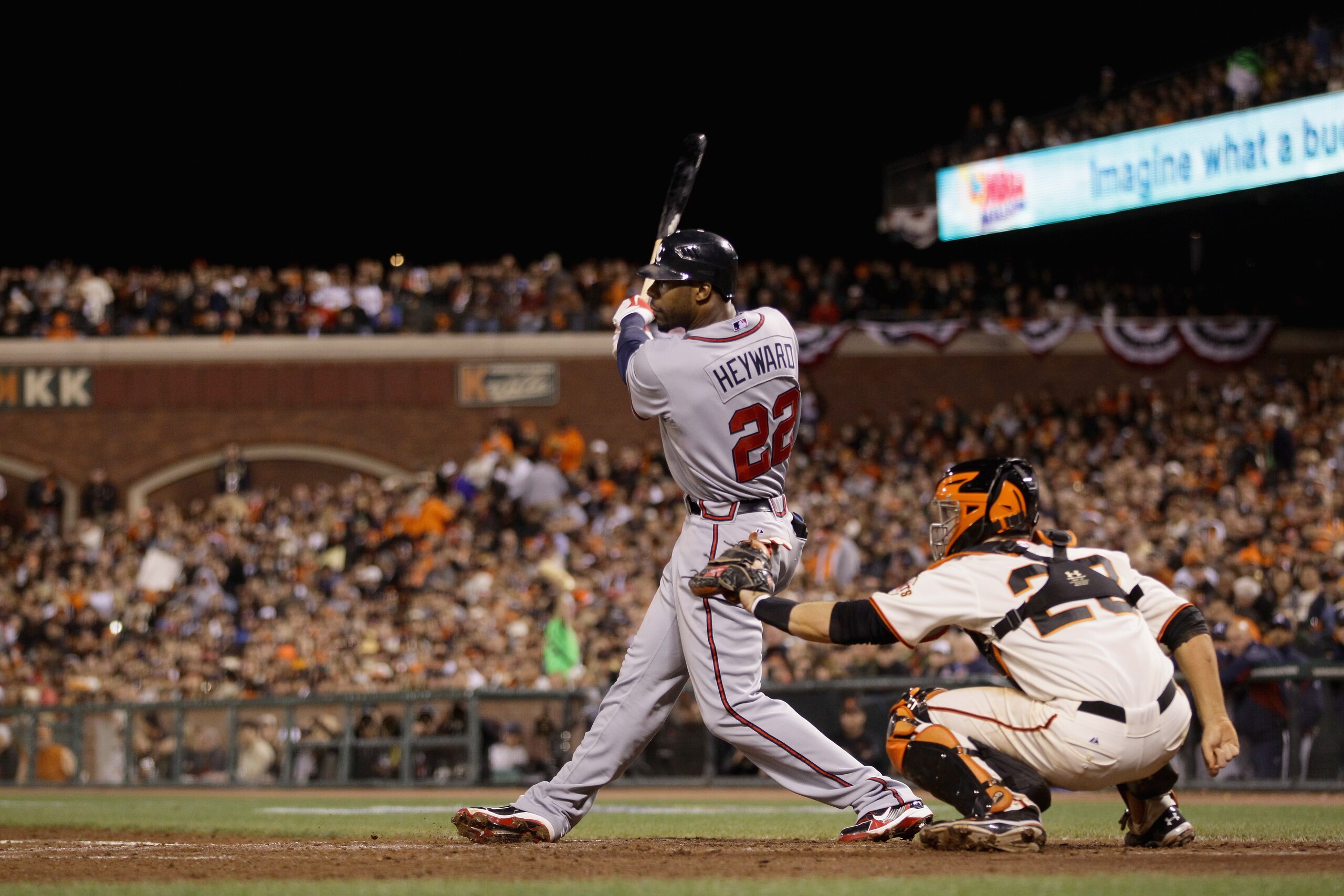 SAN FRANCISCO - OCTOBER 07:  Jason Heyward #22 of the Atlanta Braves bats against catcher Buster Posey #28 and the San Francisco Giants during game 1 of the NLDS at AT&T Park on October 7, 2010 in San Francisco, California.  (Photo by Ezra Shaw/Getty Imag
