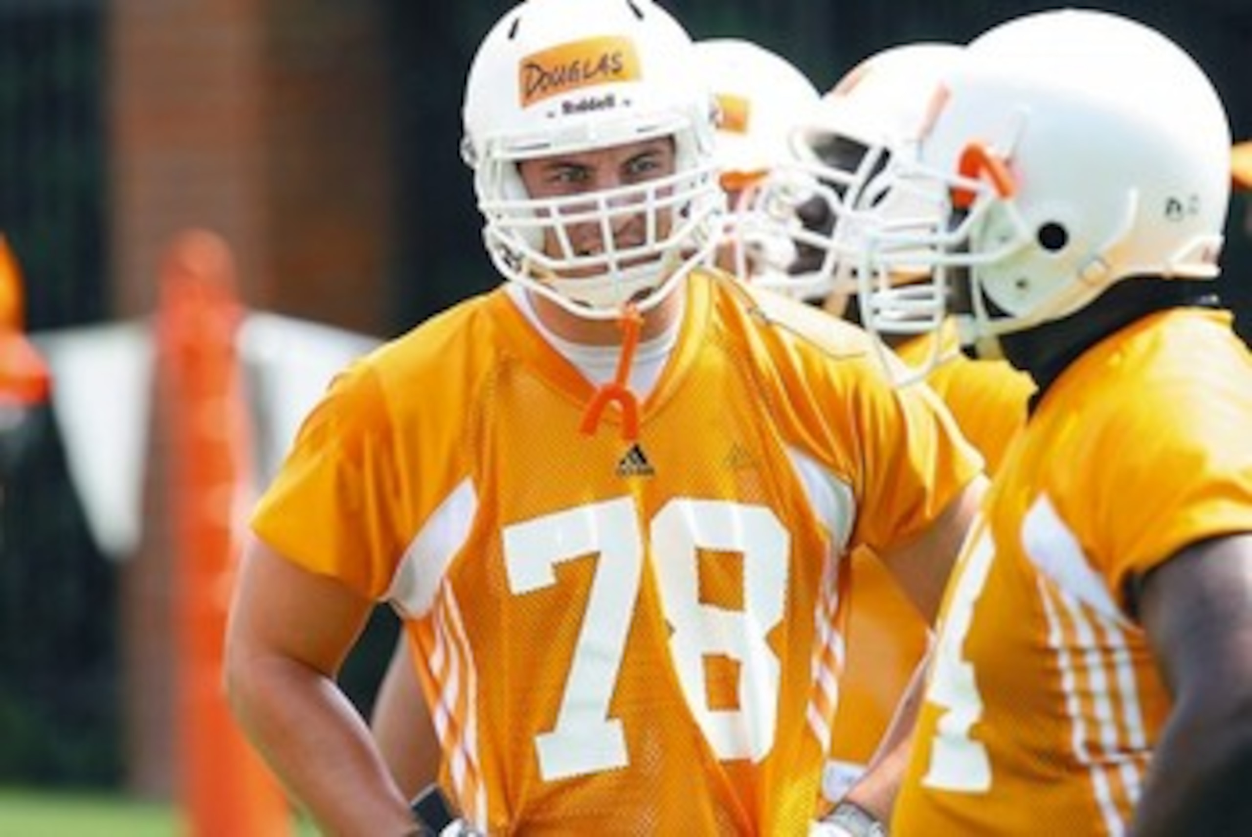 Even as a freshman at Tennessee, he was taller than most linemen Even as a freshman at Tennessee, he was taller than most linemen