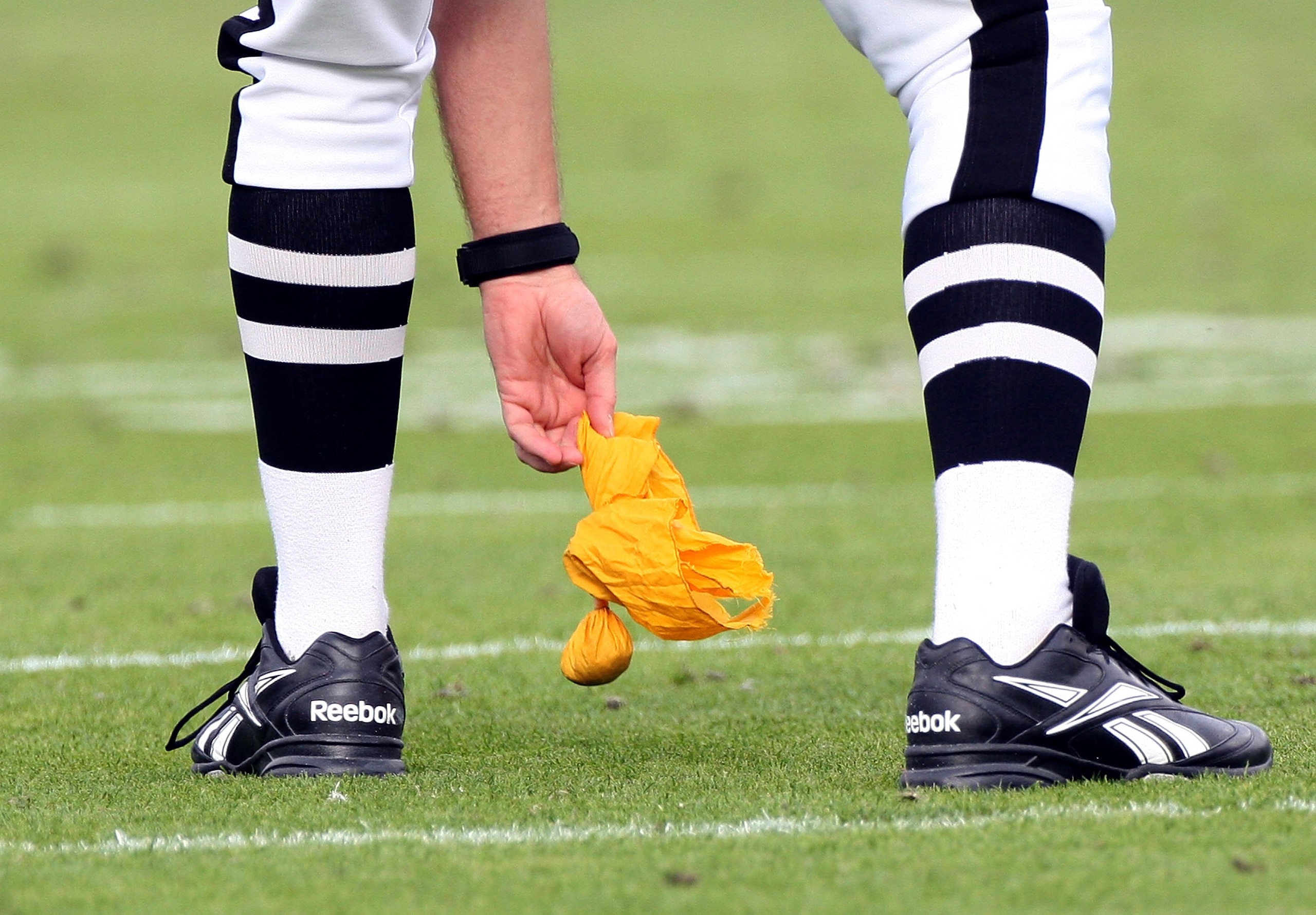 JACKSONVILLE, FL - DECEMBER 14:  A yellow penalty flag is picked during the game at Jacksonville Municipal stadium on December 14, 2008 in Jacksonville, Florida.  (Photo by Sam Greenwood/Getty Images)