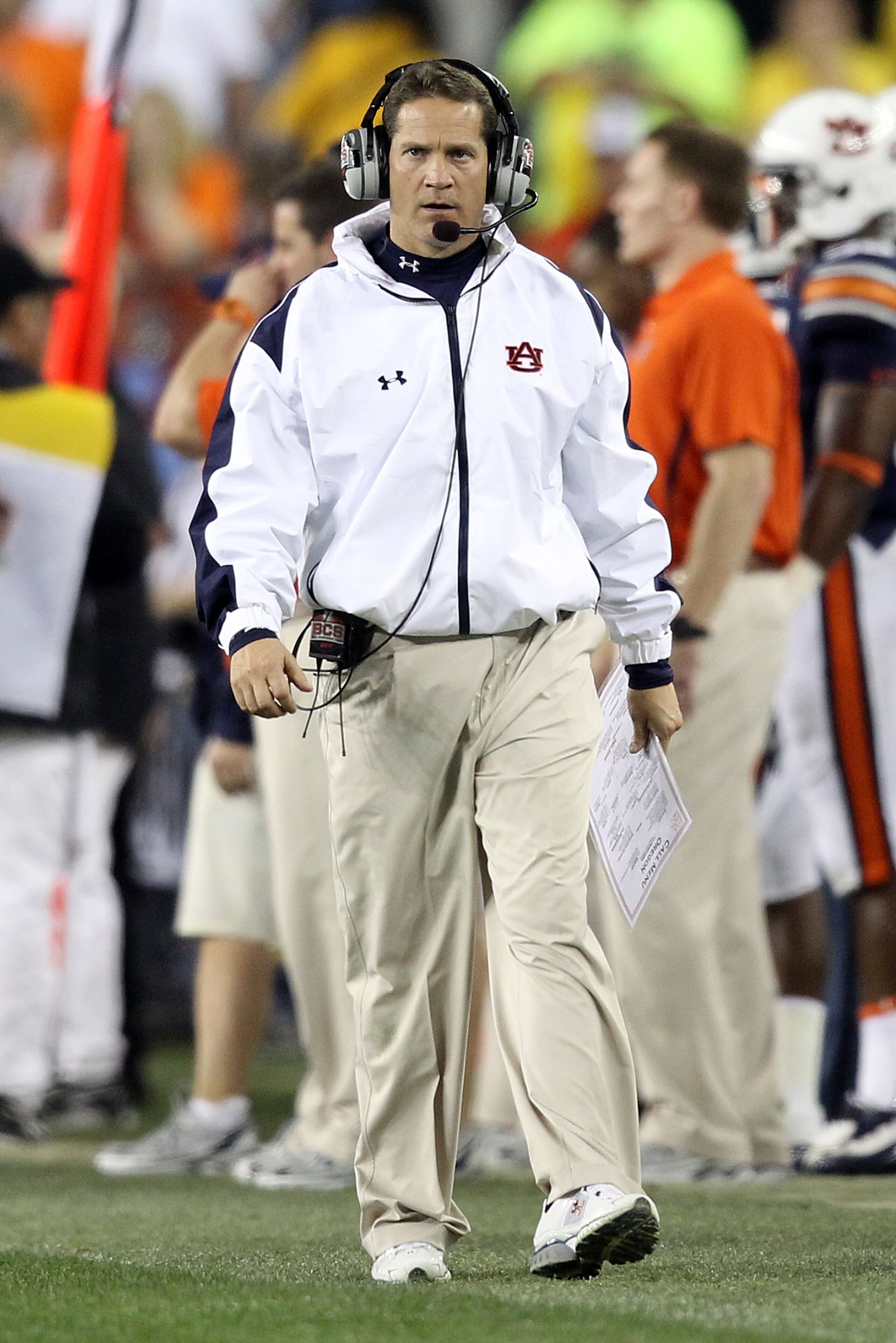 GLENDALE, AZ - JANUARY 10:  Head coach Gene Chizik of the Auburn Tigers walks the sidelines during the Tostitos BCS National Championship Game against the Oregon Ducks at University of Phoenix Stadium on January 10, 2011 in Glendale, Arizona.  (Photo by C