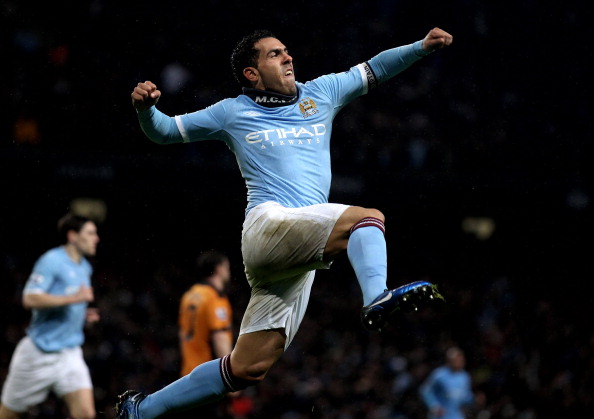 MANCHESTER, ENGLAND - JANUARY 15:  Carlos Tevez of Manchester City celebrates scoring his team's second goal during the Barclays Premier League match between Manchester City and Wolverhampton Wanderers at the City of Manchester Stadium on January 15, 2011