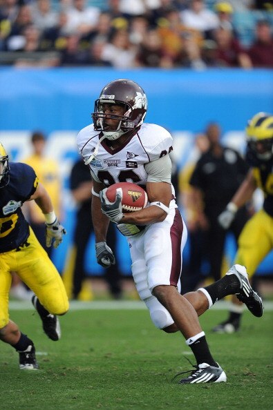 JACKSONVILLE, FL - JANUARY 01:  Michael Carr #86 of the Mississippi State Bulldogs scores on a 31 yard pass reception in the second half against the Michigan Wolverines during the Gator Bowl at EverBank Field on January 1, 2011 in Jacksonville, Florida  (