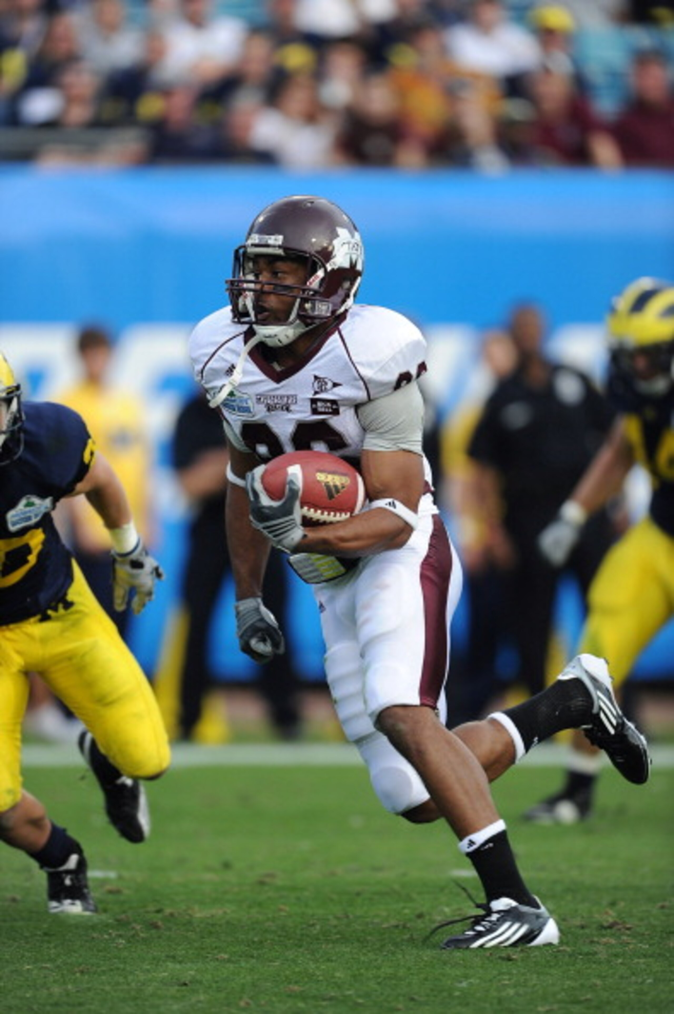 JACKSONVILLE, FL - JANUARY 01:  Michael Carr #86 of the Mississippi State Bulldogs scores on a 31 yard pass reception in the second half against the Michigan Wolverines during the Gator Bowl at EverBank Field on January 1, 2011 in Jacksonville, Florida  (