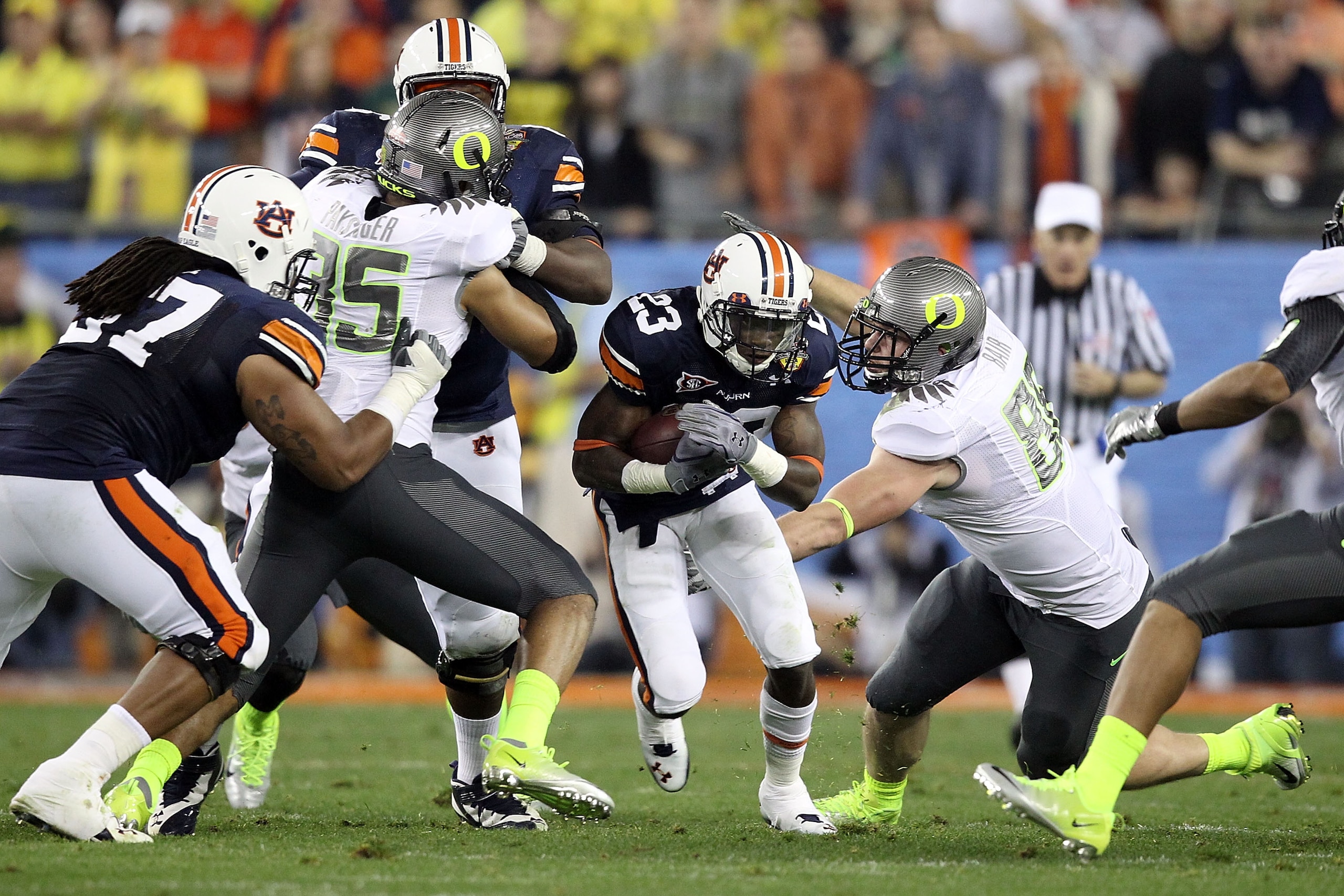 GLENDALE, AZ - JANUARY 10:  Sam Brown #23 of the Auburn Tigers runs against the Oregon Ducks during the Tostitos BCS National Championship Game at University of Phoenix Stadium on January 10, 2011 in Glendale, Arizona.  (Photo by Christian Petersen/Getty