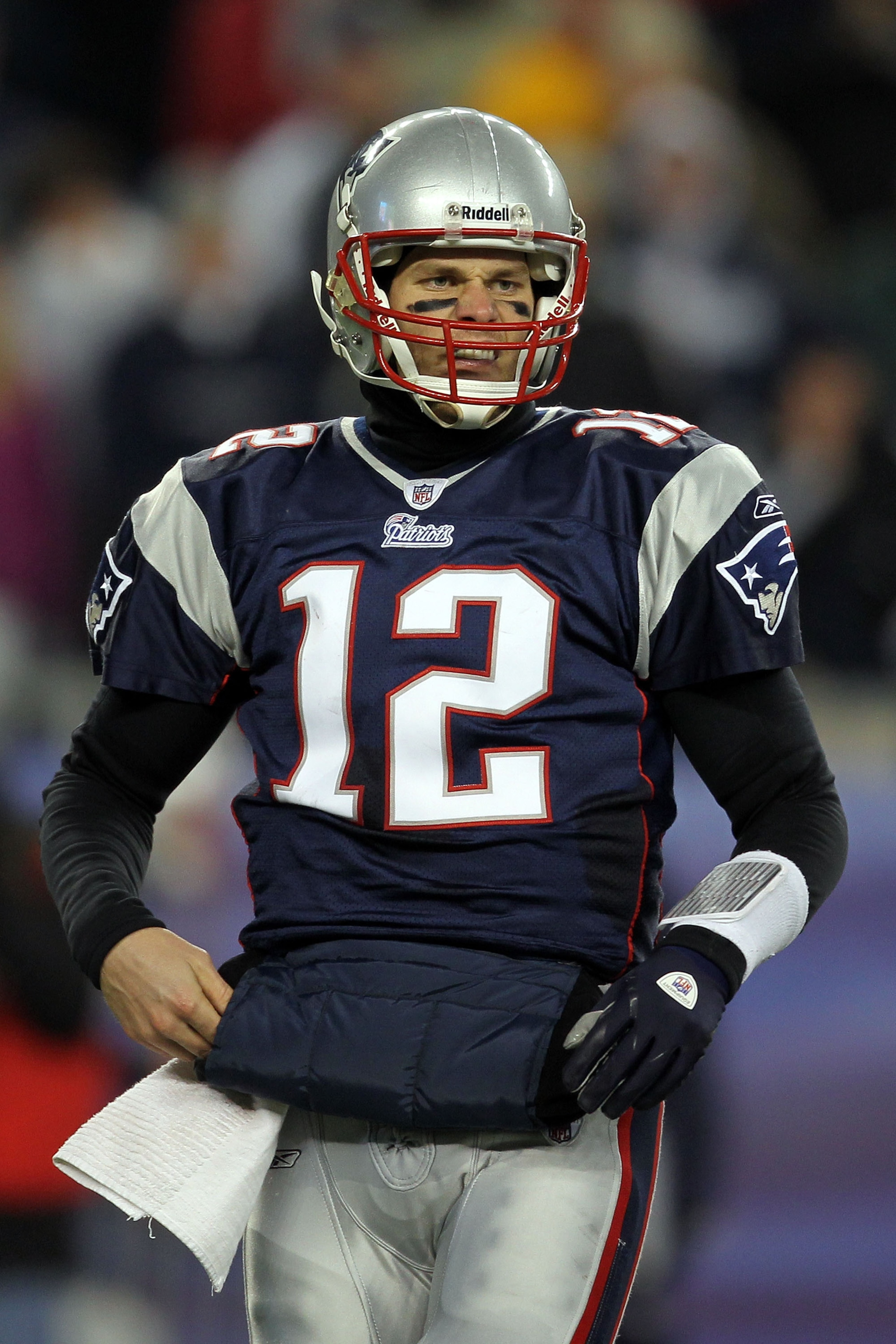 FOXBORO, MA - JANUARY 16:  Tom Brady #12 of the New England Patriots looks on during their 2011 AFC divisional playoff game agaGillette against the New York Jets Stadium on January 16, 2011 in Foxboro, Massachusetts.  (Photo by Jim Rogash/Getty Images)