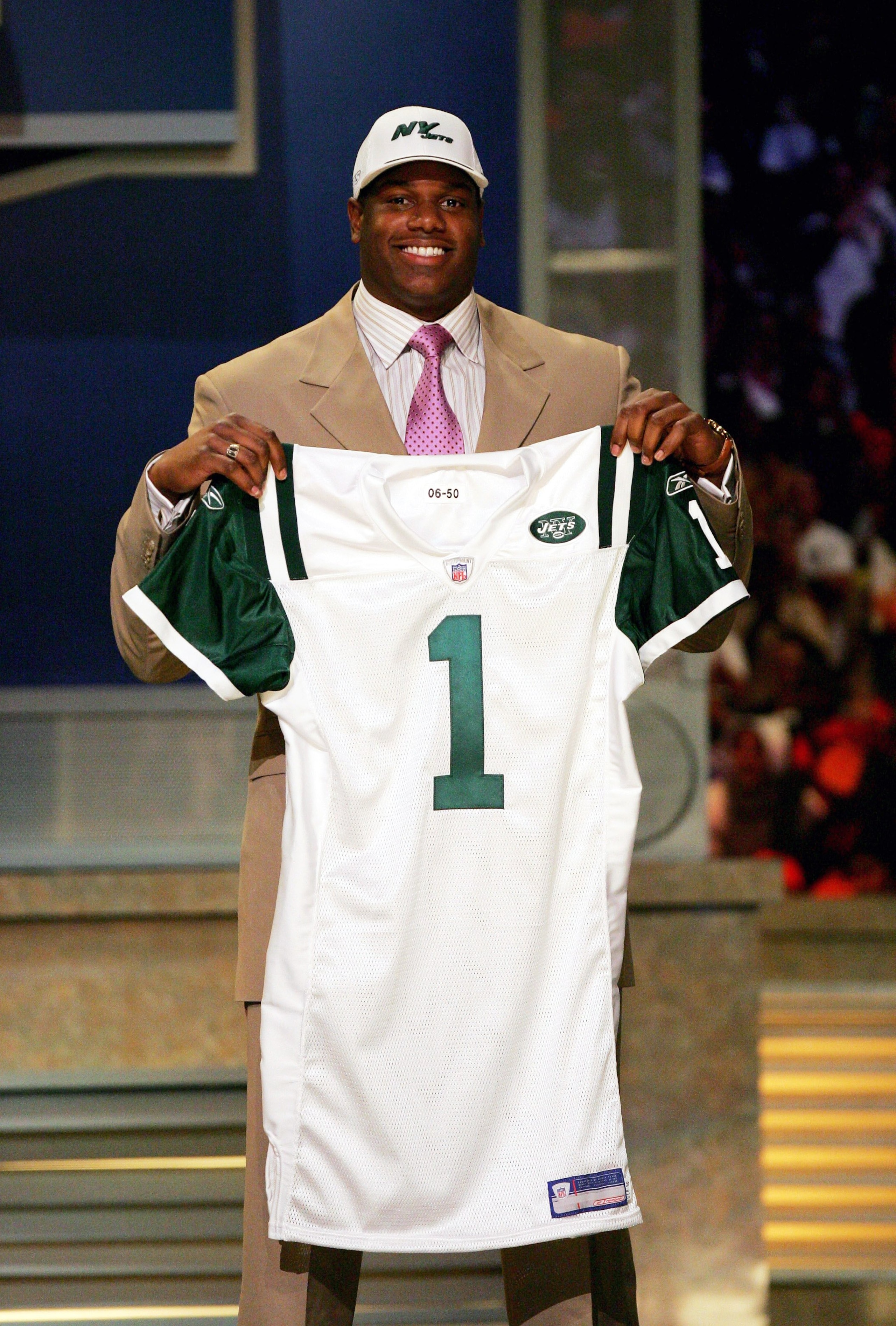 NEW YORK - APRIL 29:  D'Brickashaw Ferguson holds up a jersey after being selected fourth overall by the New York Jets in the 2006 NFL Draft at Radio City Music Hall on April 29, 2006 in New York City.  (Photo by Ezra Shaw/Getty Images)