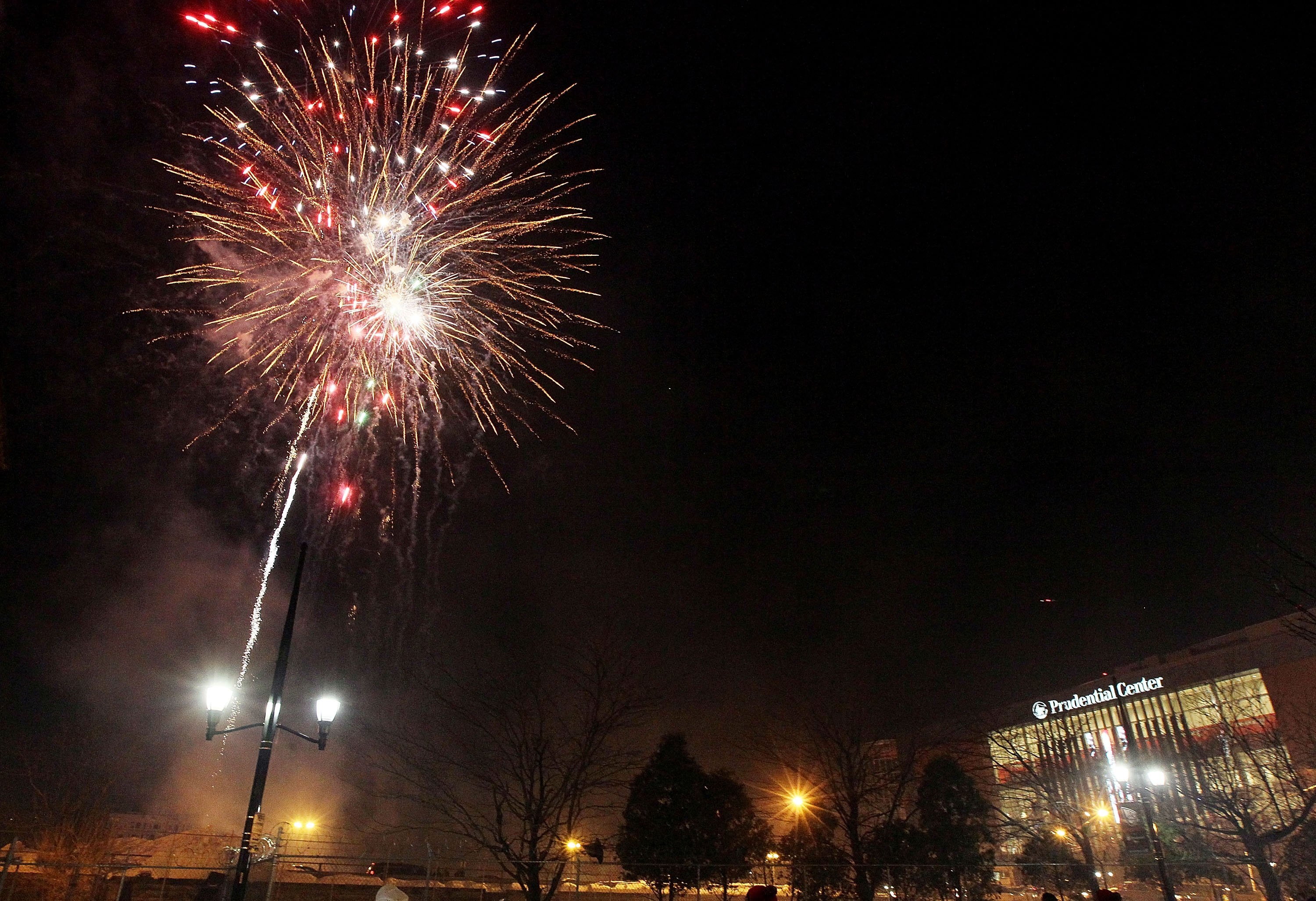 NEWARK, NJ - DECEMBER 31:  Fireworks explode over the Prudential Center after the NHL game between the Atlanta Thrashers and the New Jersey Devils on December 31, 2010 in Newark, New Jersey. The Devils defeated the Thrashers 3-1.  (Photo by Jim McIsaac/Ge